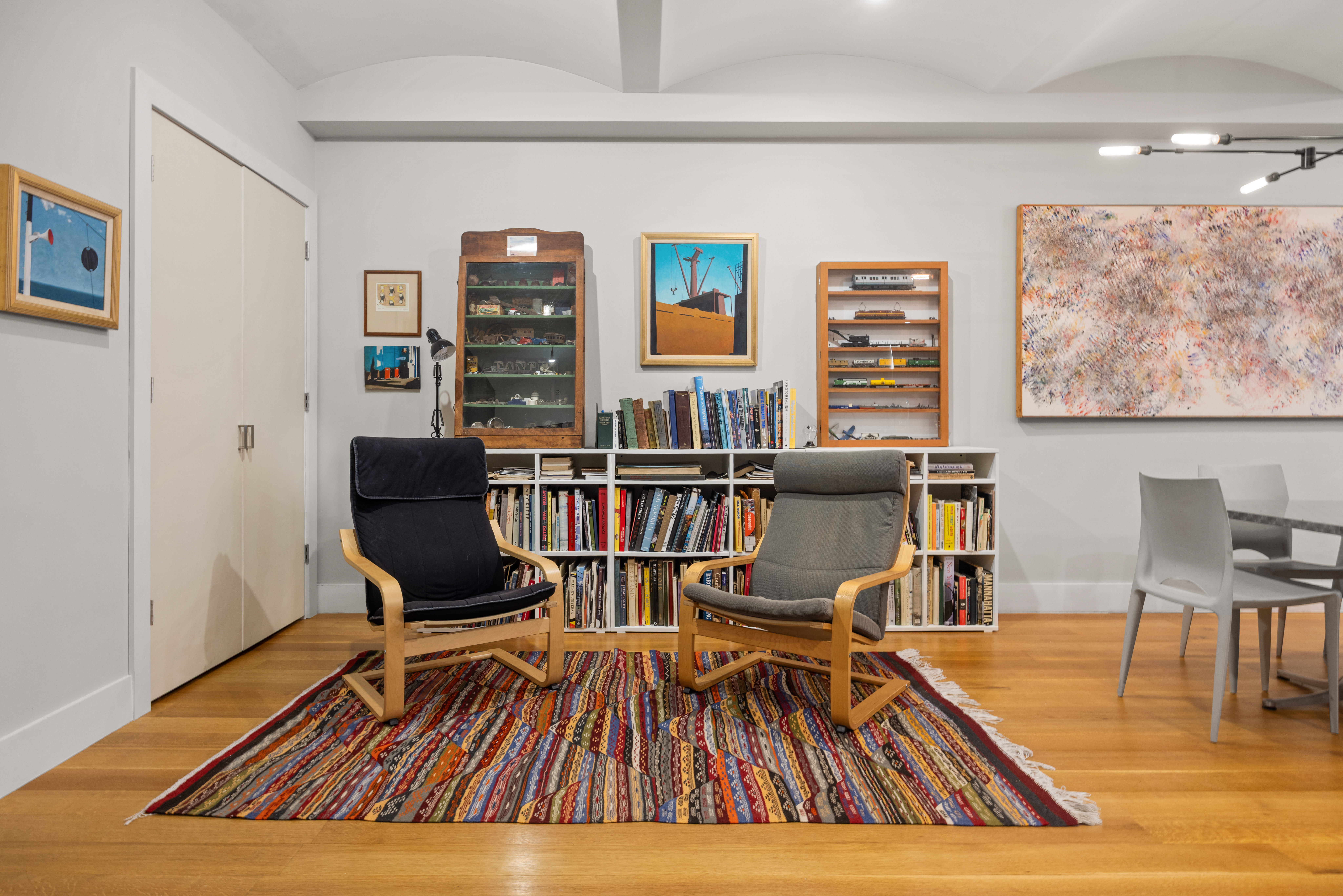 42 Ann Street, Unit 5 Manhattan, NY 10038 - Photo 8 of 16 a living room with furniture and wooden floor