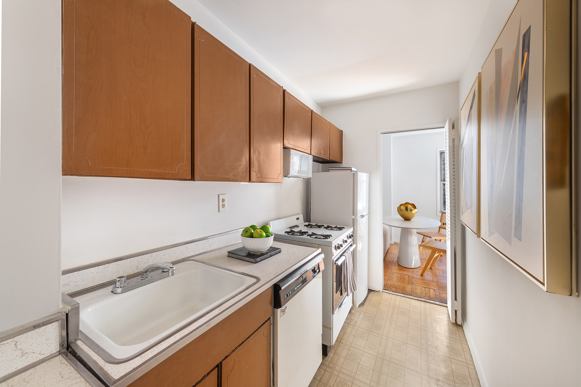 311 East 71st Street, Unit 3F Manhattan, NY 10021 - Photo 3 of 6 a room with storage and utility