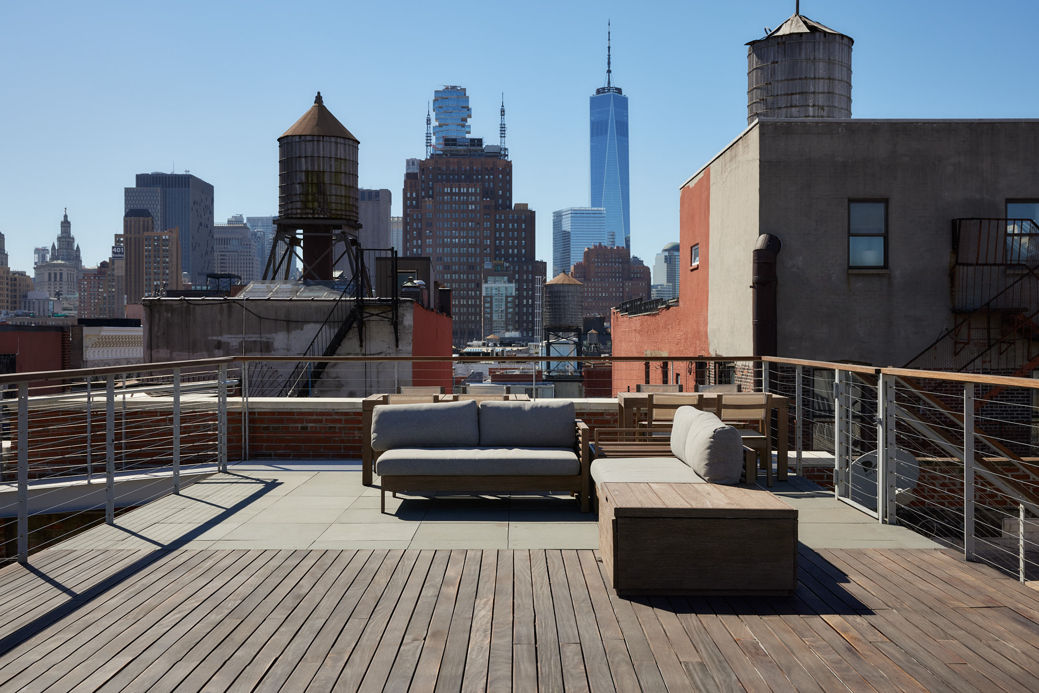 101 Wooster Street, Unit 3F/4F Manhattan, NY 10012 - Photo 22 of 24 a view of roof deck with outdoor seating and city view