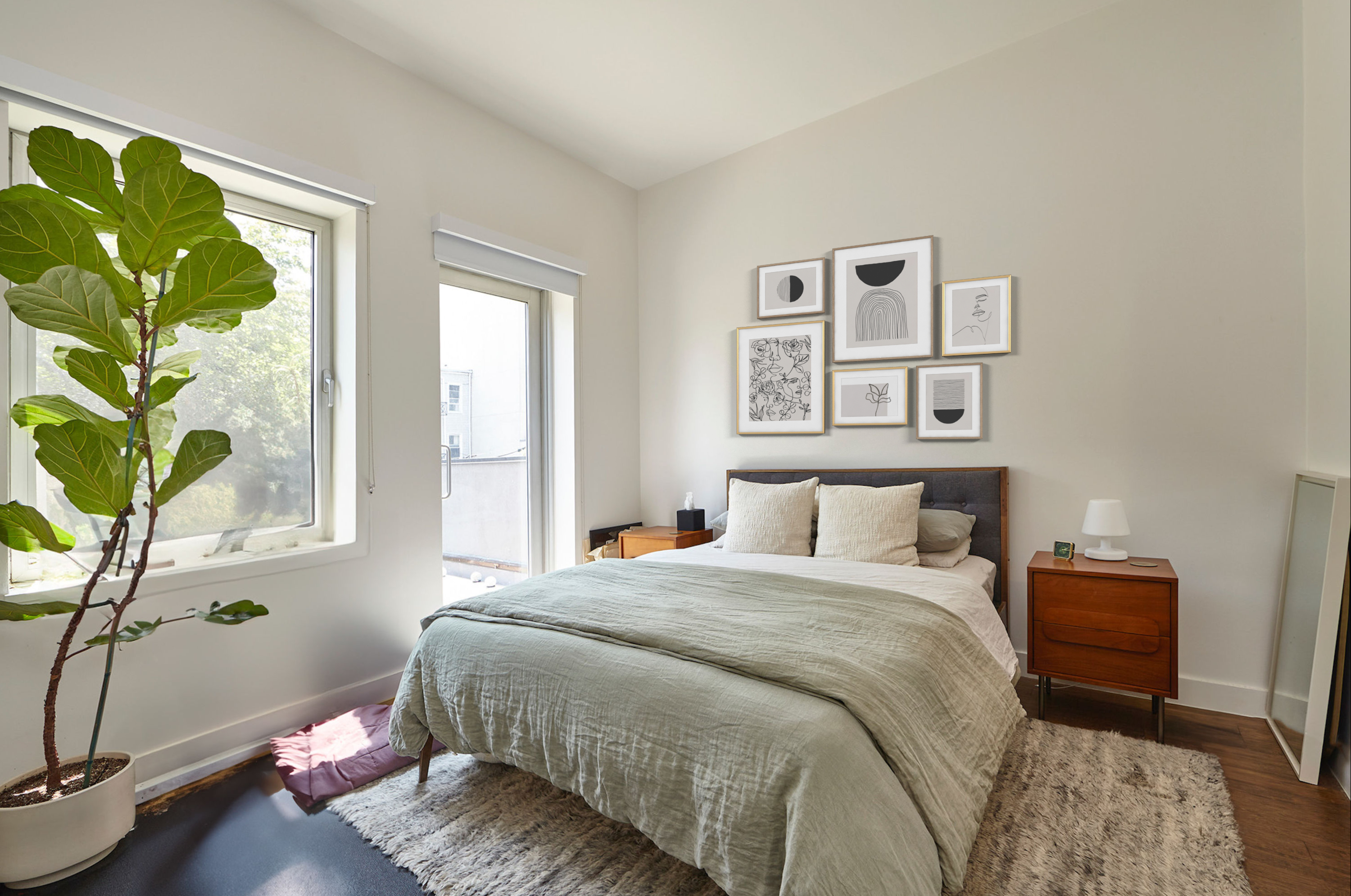144 North 10th Street, Unit 2D Brooklyn, NY 11249 - Photo 5 of 12 a bed sitting in a bedroom next to a window