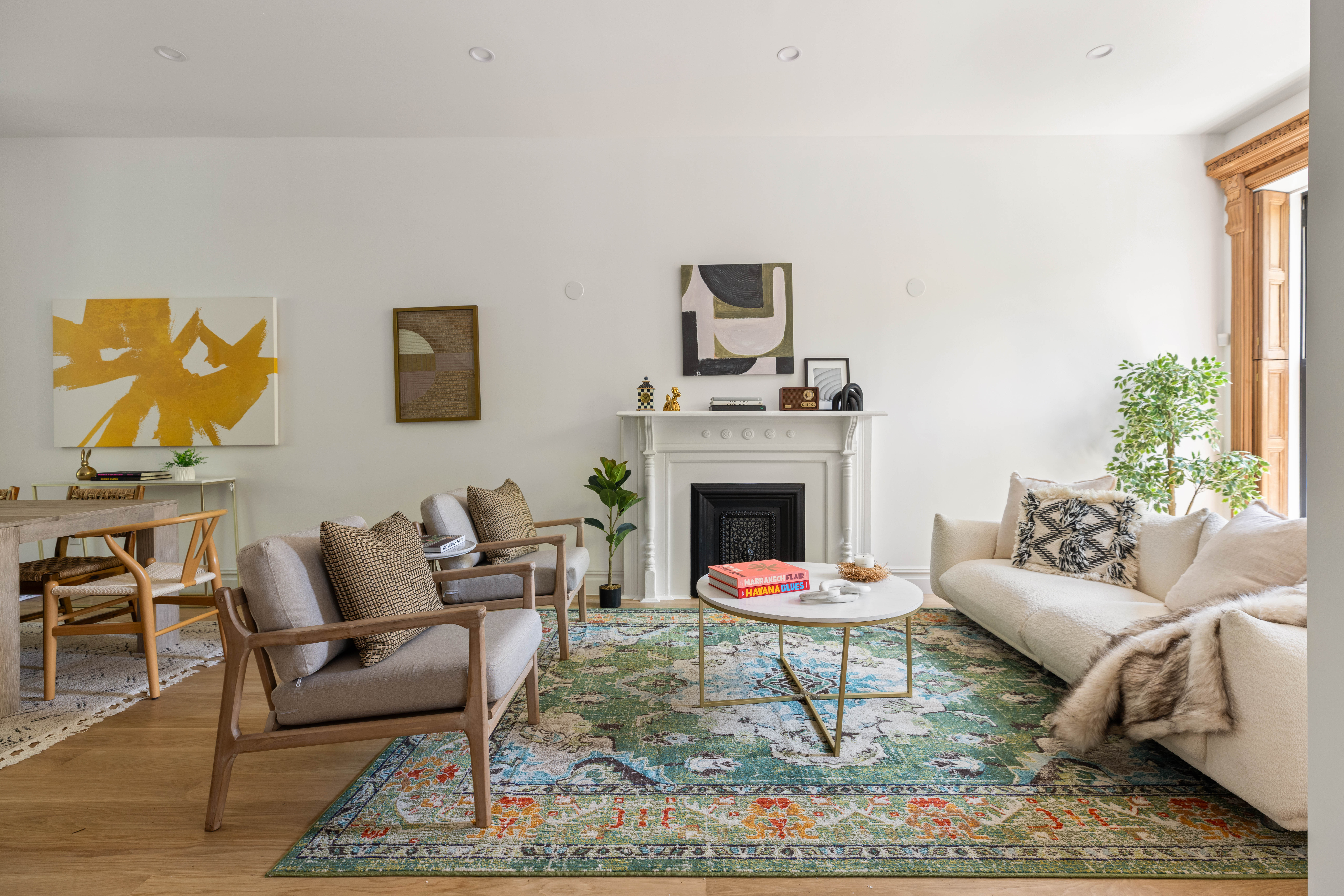 521 Monroe Street, Unit TWNHS Brooklyn, NY 11221 - Photo 3 of 17 a living room with furniture a rug and a fireplace