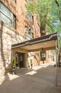 a view of a building with a street