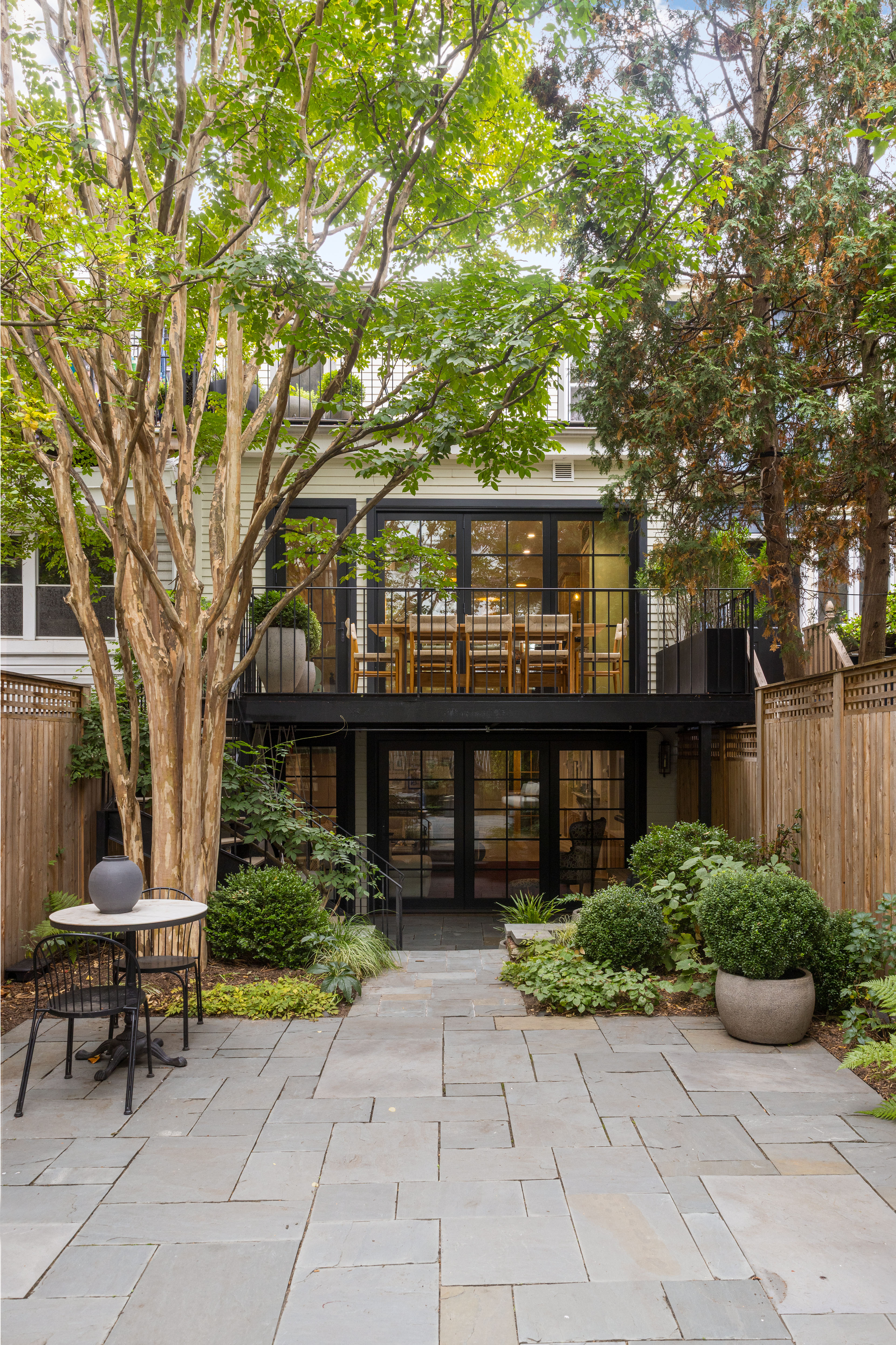 309 Pacific Street Brooklyn, NY 11201 - Photo 20 of 22 a front view of a house with garden