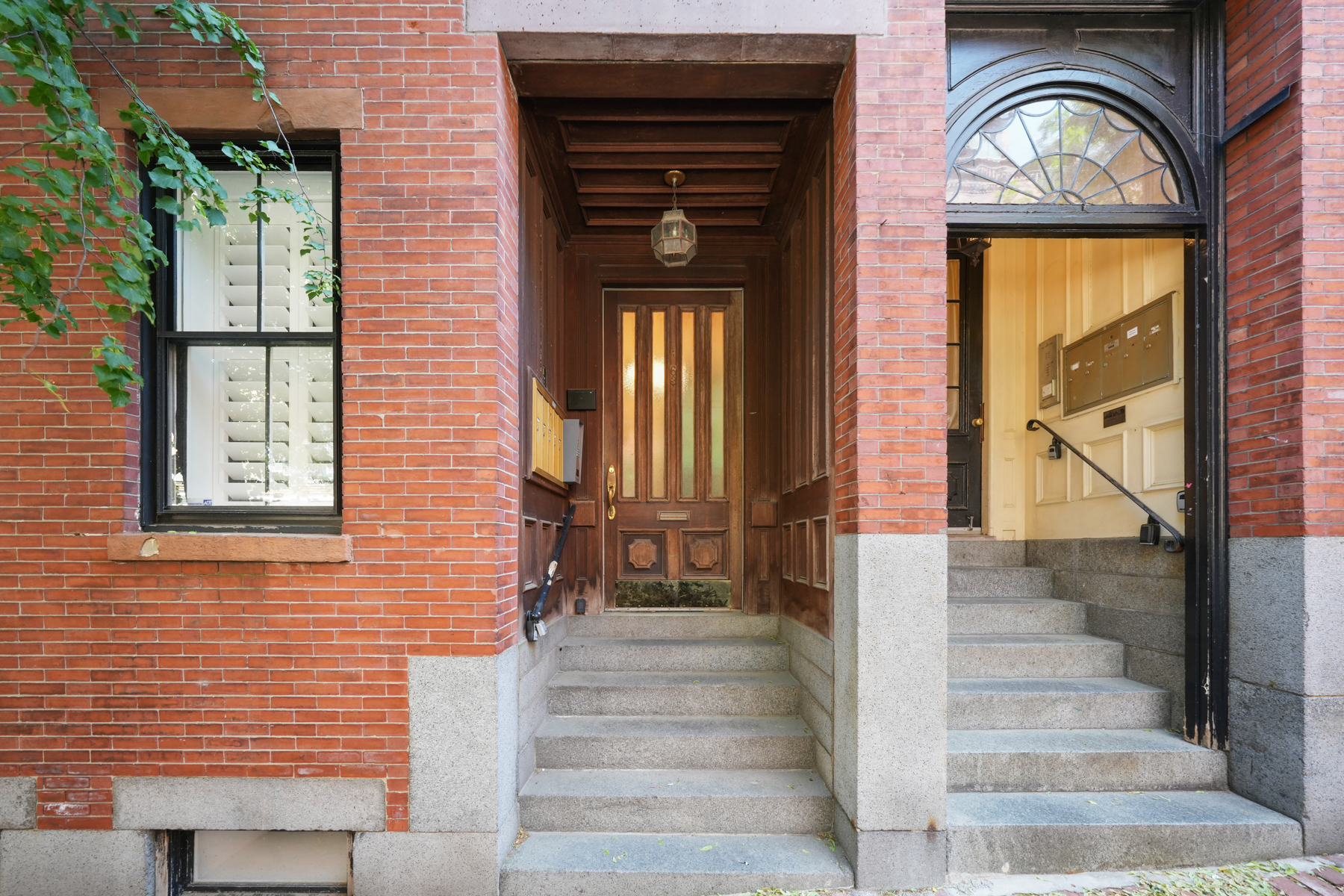 63 West Cedar Street, Unit 3 Boston, MA 02114 - Photo 15 of 17 a front view of a house with a window