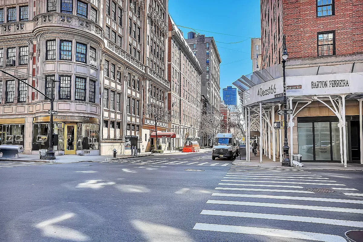 20 East 66th Street, Unit 5B Manhattan, NY 10065 - Photo 7 of 9 a view of a building with a street