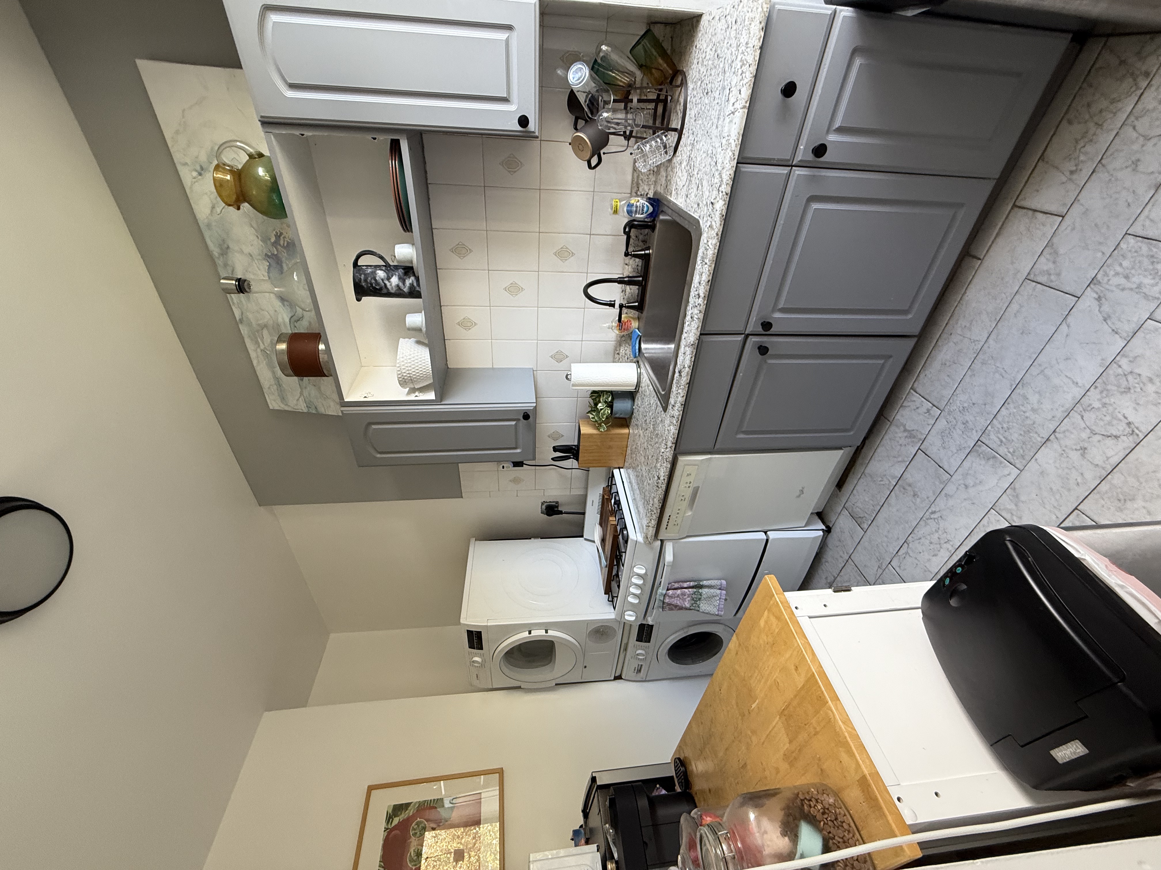 230 17th Street, Unit 2 Brooklyn, NY 11215 - Photo 3 of 16 a kitchen with cabinets a sink and appliances
