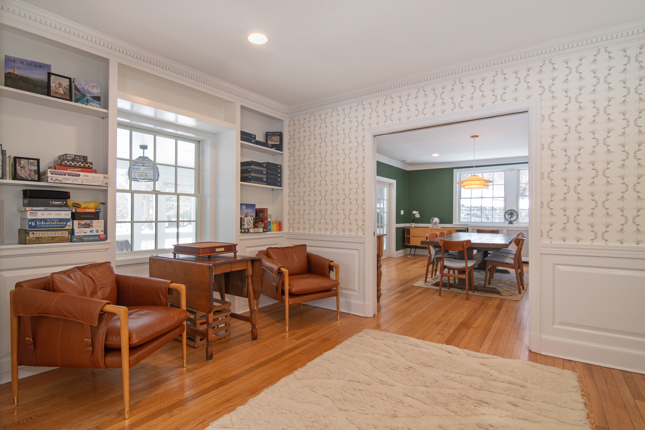 41 Harris Road Katonah, NY 10536 - Photo 16 of 48 a living room with furniture a rug and a window