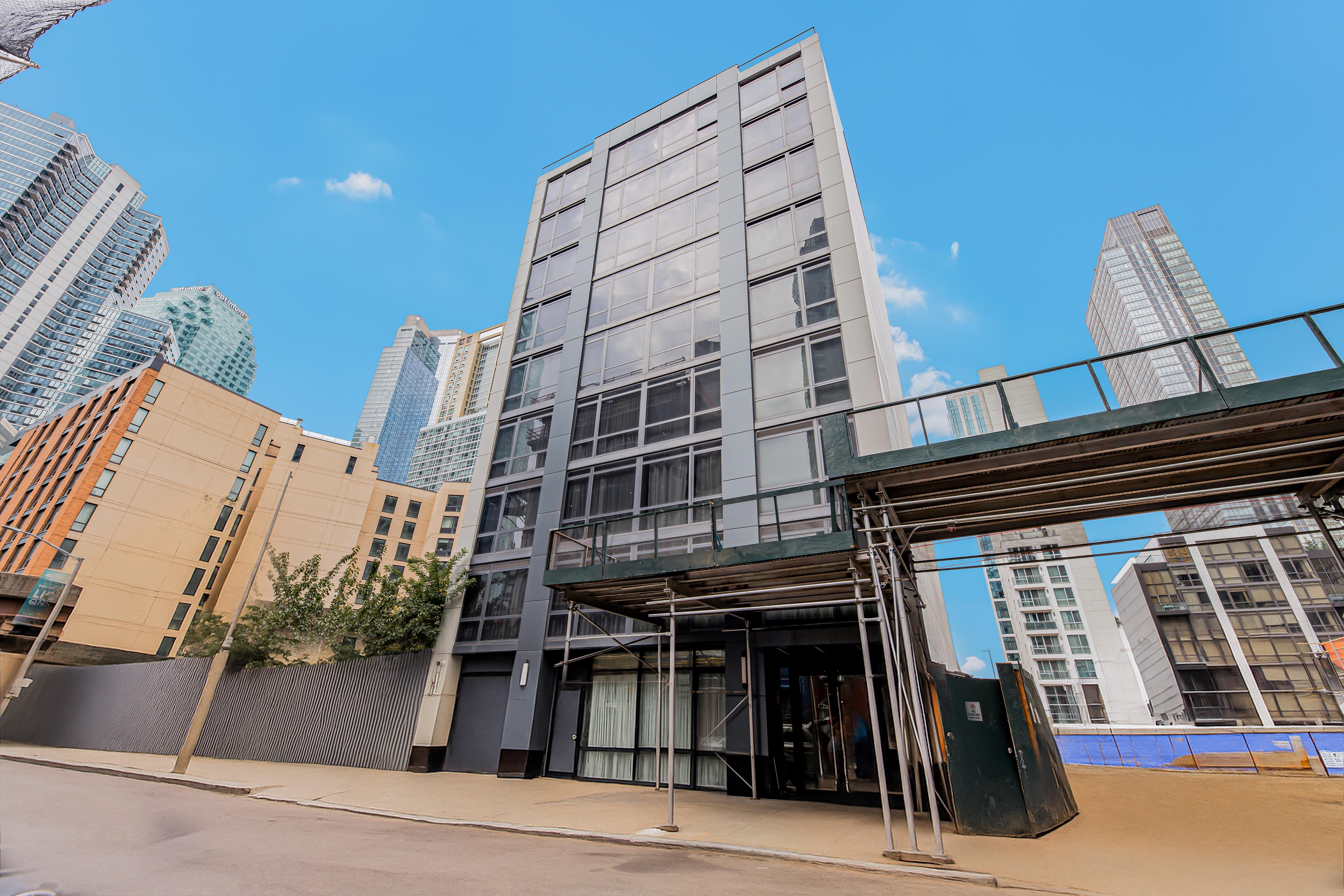 42-50 27th Street, Unit 9C Queens, NY 11101 - Photo 29 of 32 front view of a building