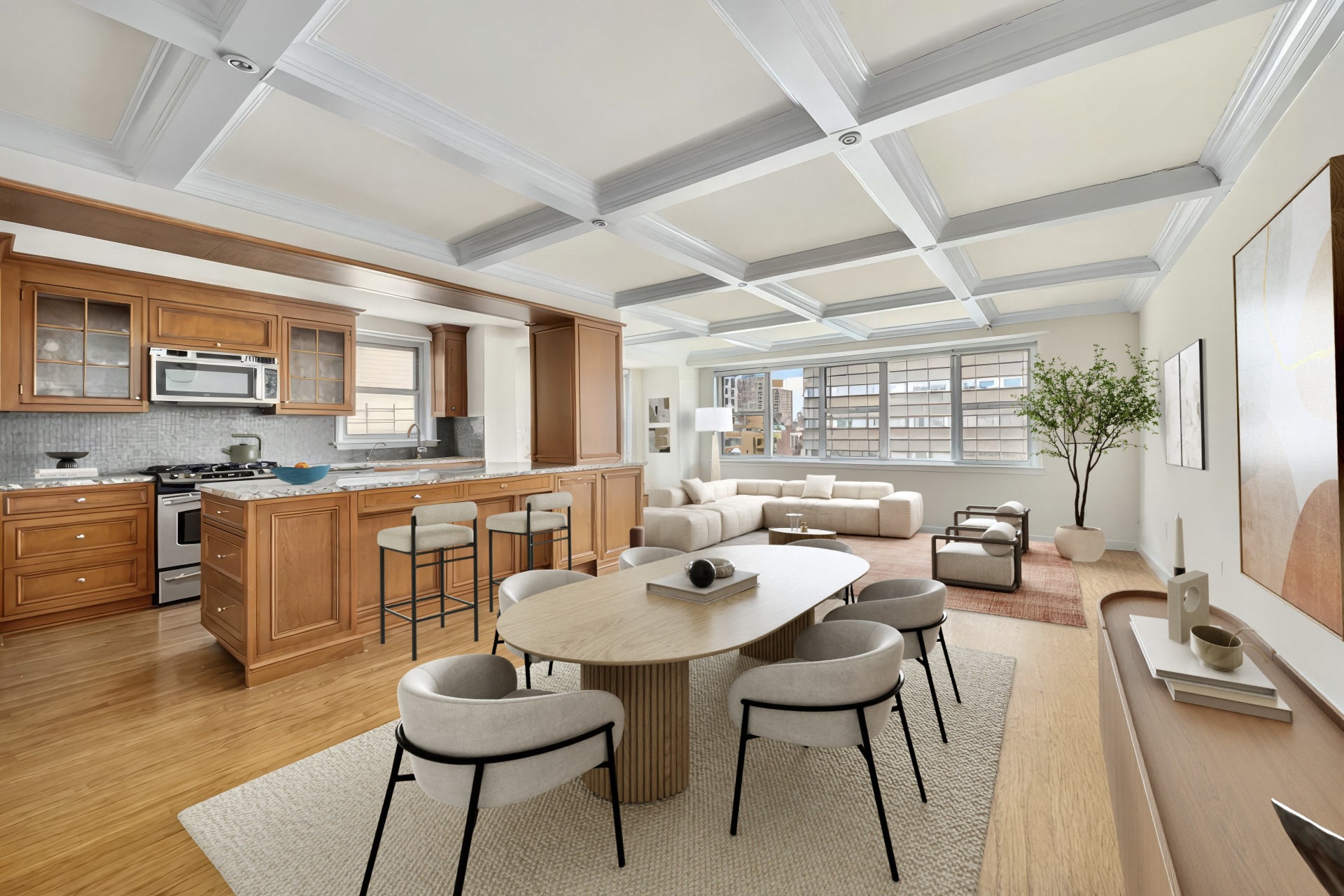 69 5th Avenue, Unit 17HJ Manhattan, NY 10003 - Photo 3 of 10 a dinning room with stainless steel appliances kitchen island granite countertop a dining table chairs and view living room