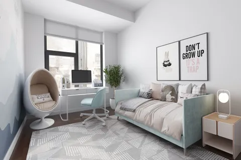 a living room with furniture a flat screen tv and a large window