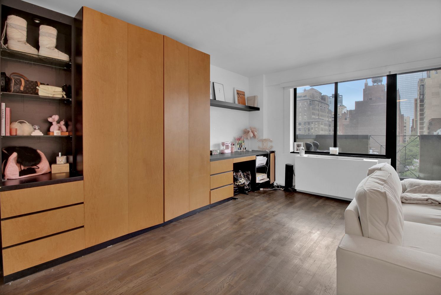 408 8th Avenue, Unit 8B Manhattan, NY 10001 - Photo 3 of 12 a bedroom with a bed and a window