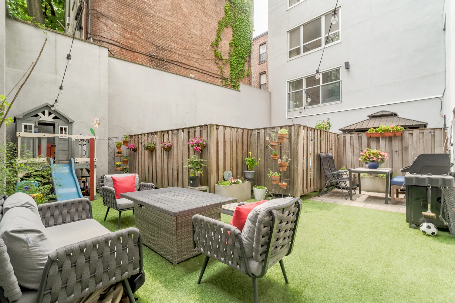 a outdoor space with patio the couches and a dining table with chairs