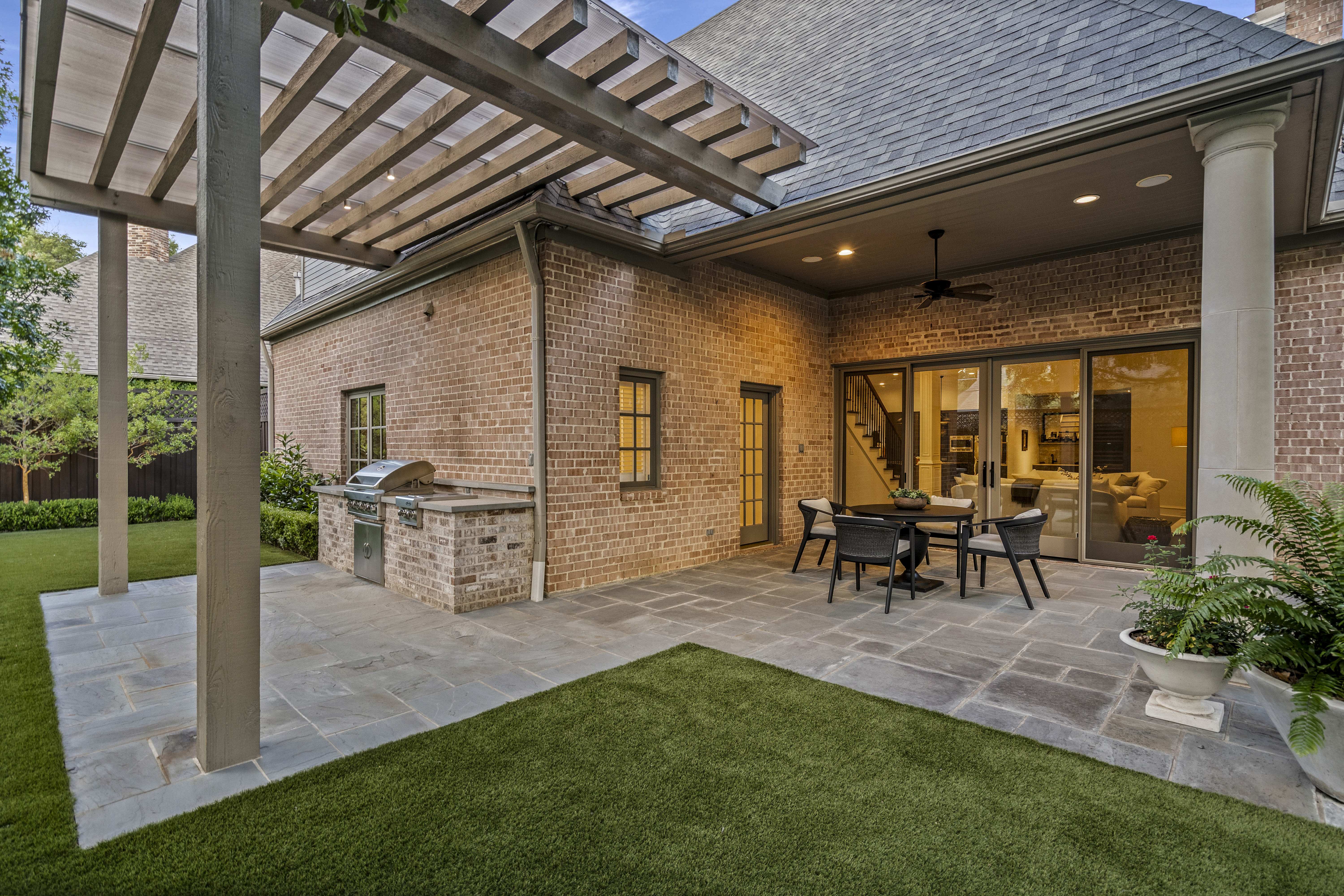6607 Meadow Road Dallas, TX 75230 - Photo 30 of 32 a view of an house with backyard porch and sitting area