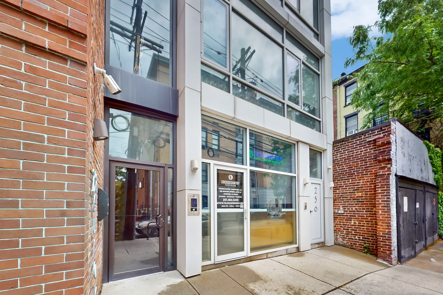 a view of a livingroom with workspace and a window