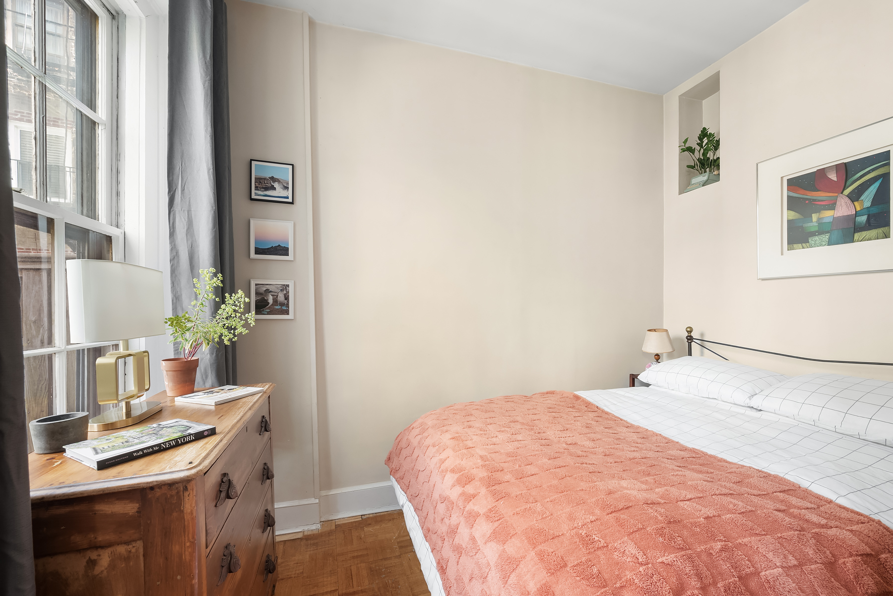 5 Charles Street, Unit 3R Manhattan, NY 10014 - Photo 8 of 14 a bedroom with a bed and a desk