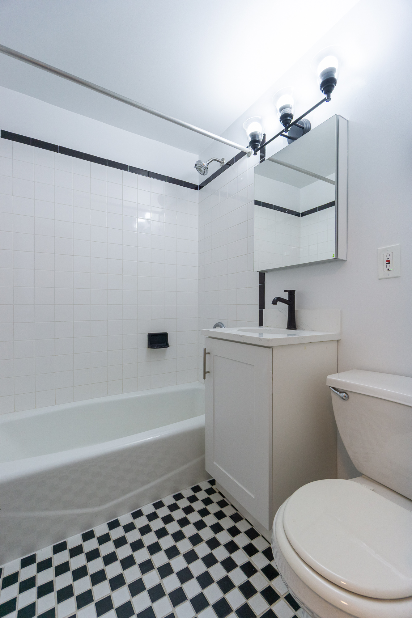 205 2nd Avenue, Unit 4A Manhattan, NY 10003 - Photo 6 of 13 a bathroom with a toilet and a bathtub