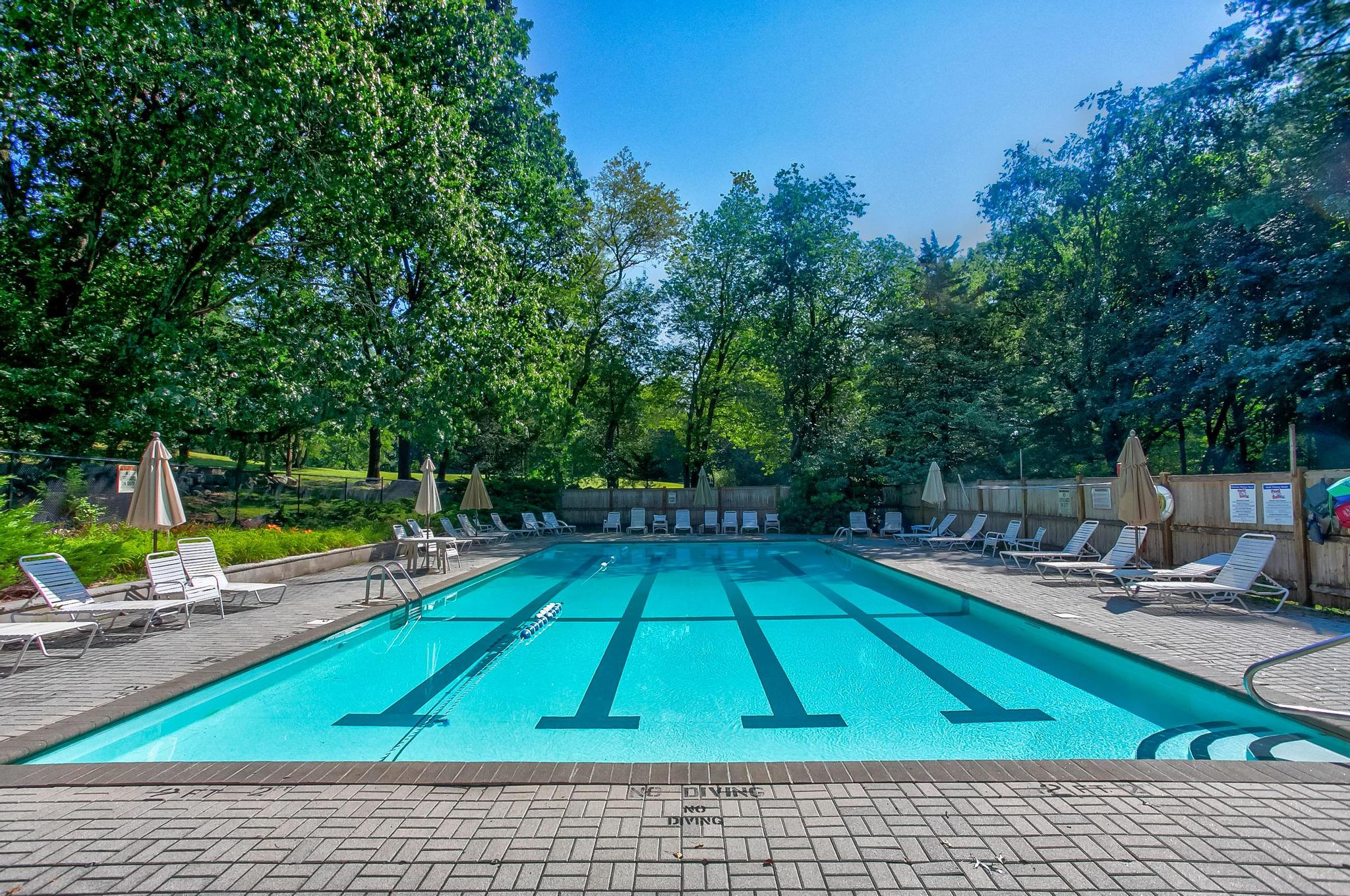 5 Field Road Lexington, MA 02421 - Photo 15 of 17 a view of a swimming pool with a patio