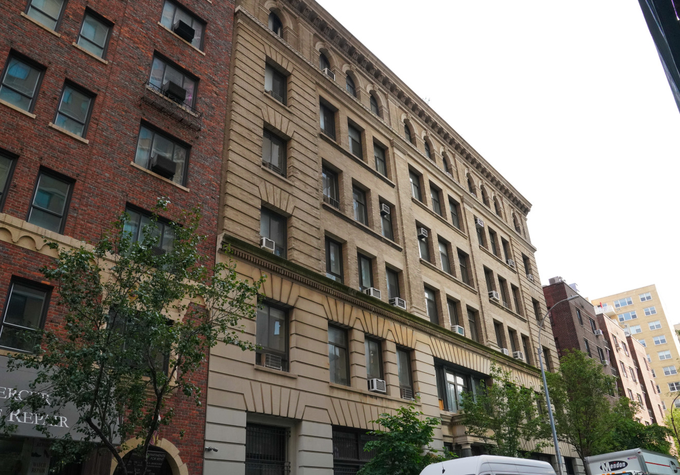303 Mercer Street, Unit A406 Manhattan, NY 10003 - Photo 8 of 11 a front view of a building