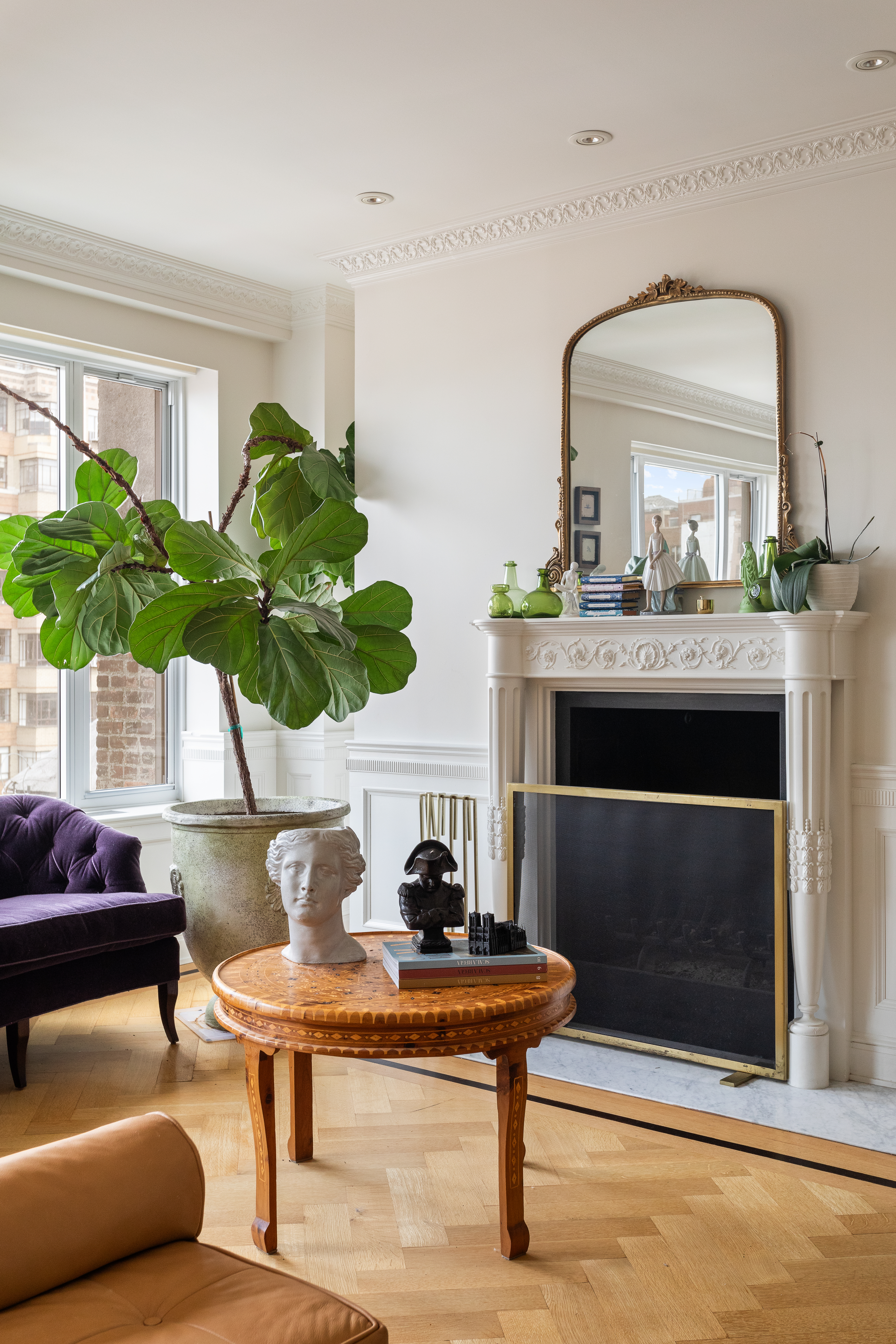 309 West 86th Street, Unit PH Manhattan, NY 10024 - Photo 4 of 19 a living room with furniture and a potted plant