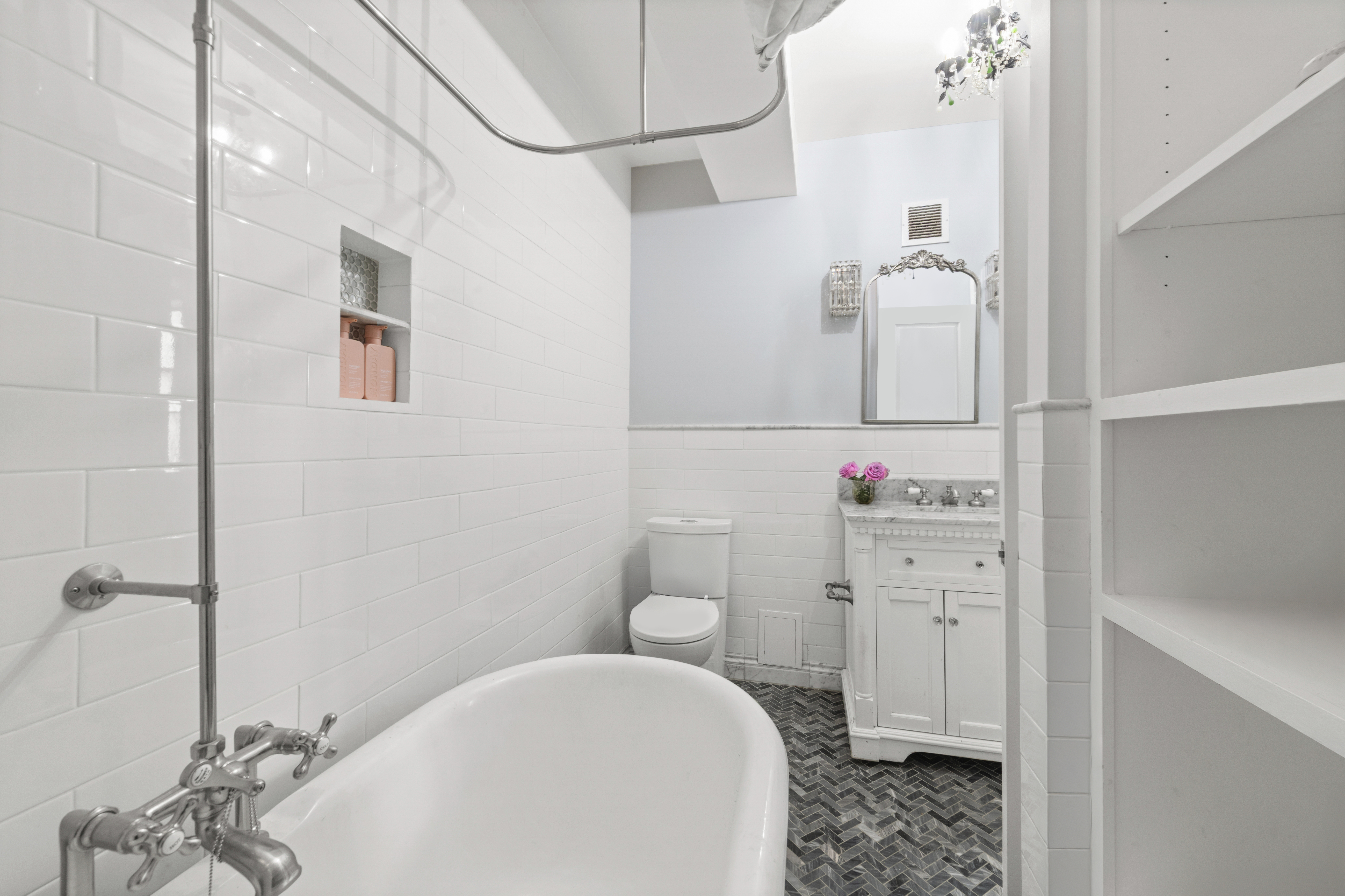 350 East 62nd Street, Unit PHD Manhattan, NY 10065 - Photo 10 of 15 a bathroom with a sink toilet and shower