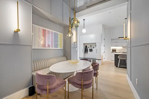 a view of a dining room with furniture