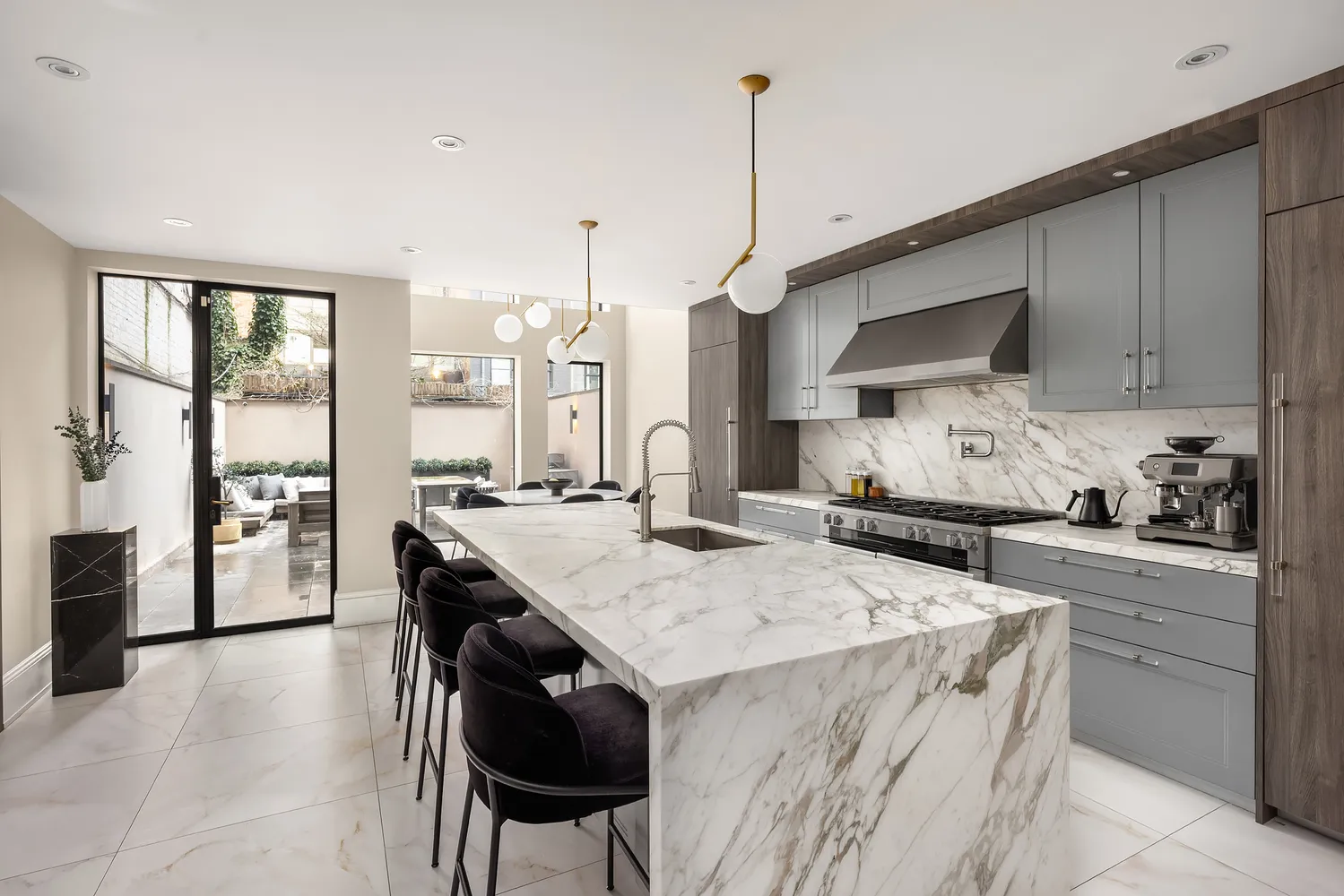 a kitchen with a stove and a sink