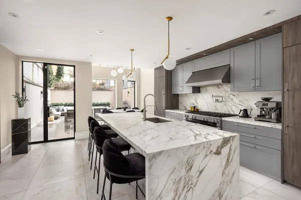 a kitchen with a stove and a sink