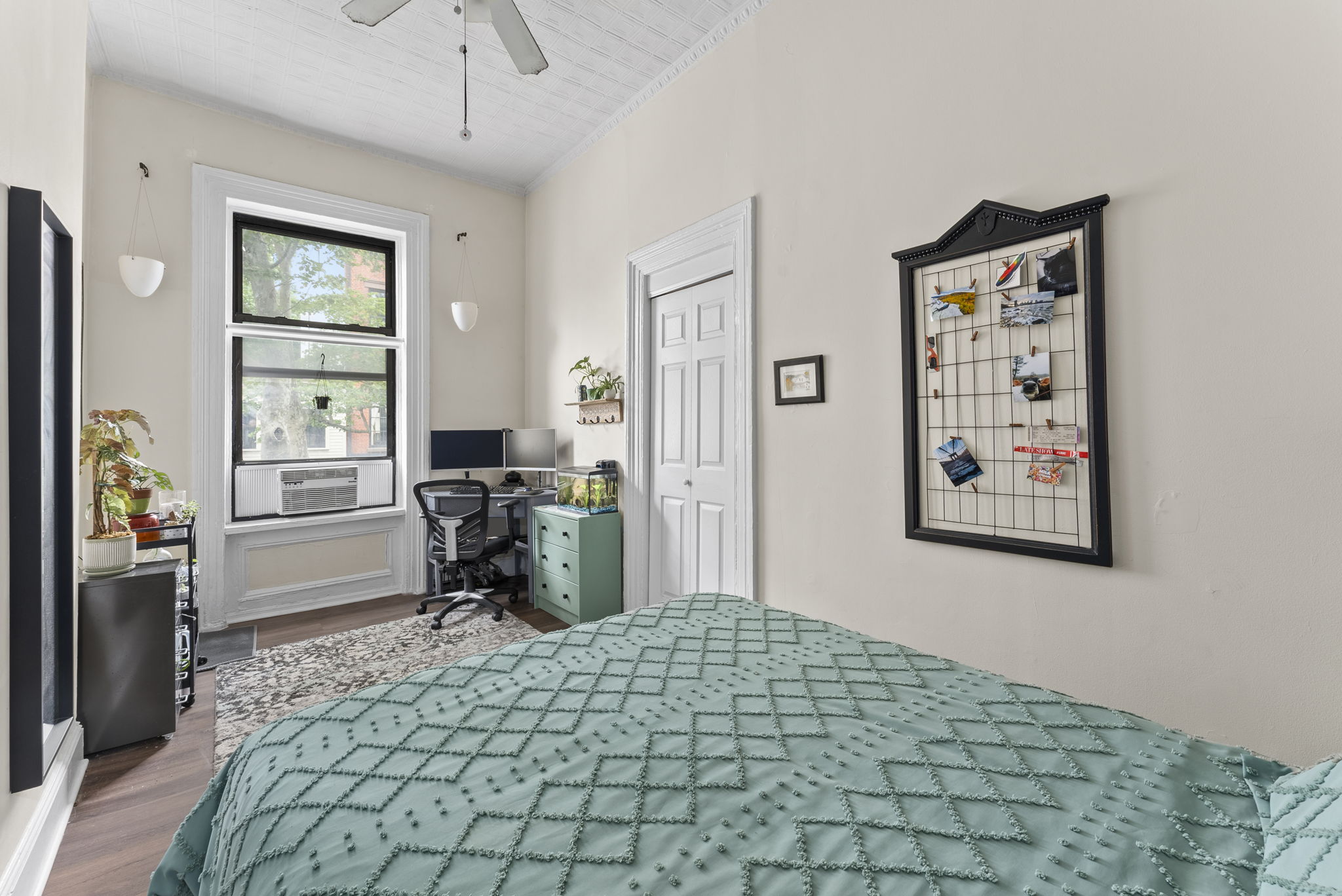 311 Henry Street, Unit 1 Brooklyn, NY 11201 - Photo 6 of 7 a bedroom with a bed and a chair