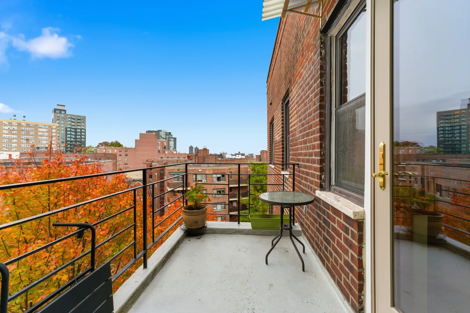 a view of a balcony with chairs