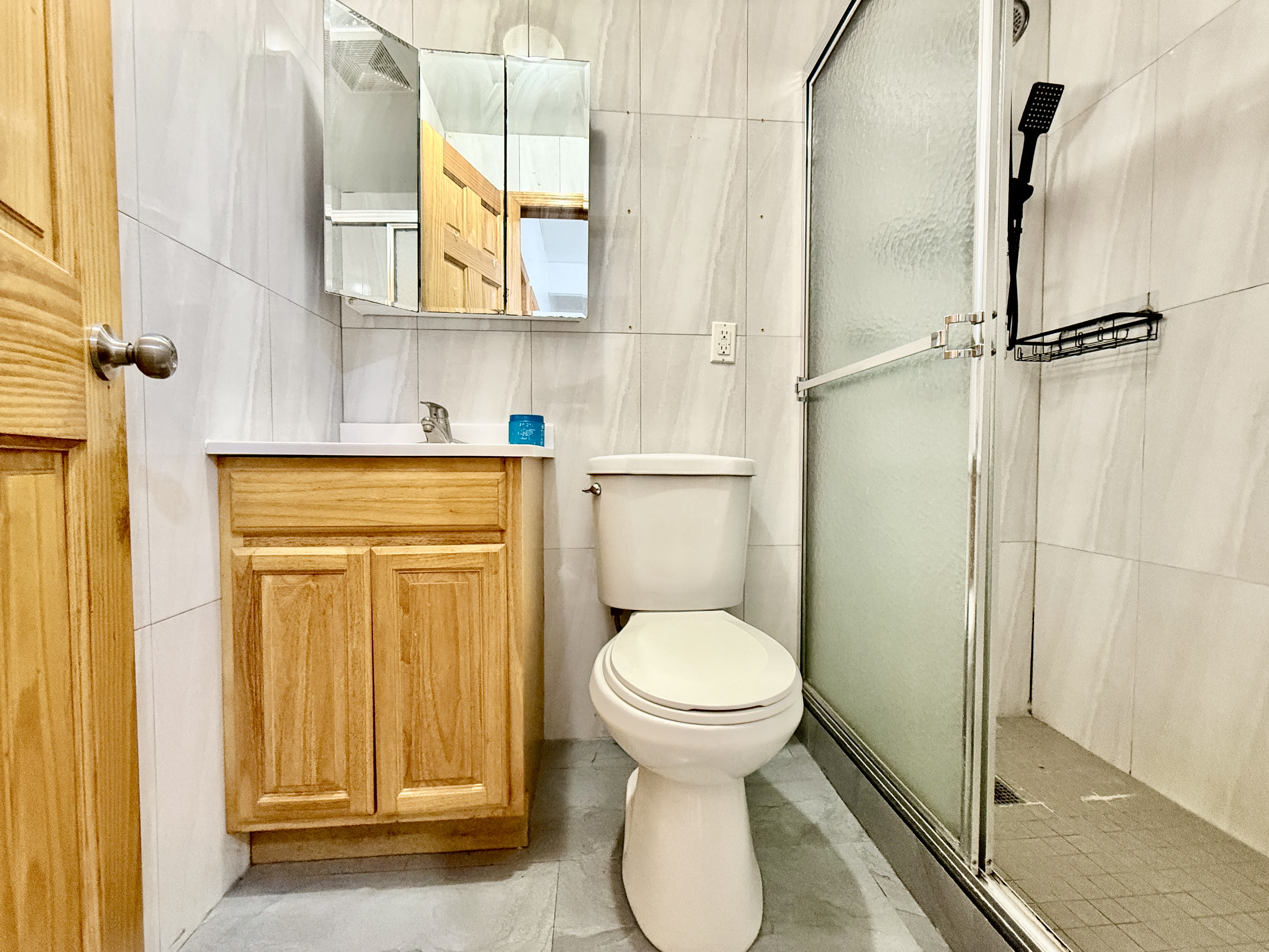 543 53rd Street, Unit 1 Brooklyn, NY 11220 - Photo 8 of 8 a bathroom with a toilet and a sink