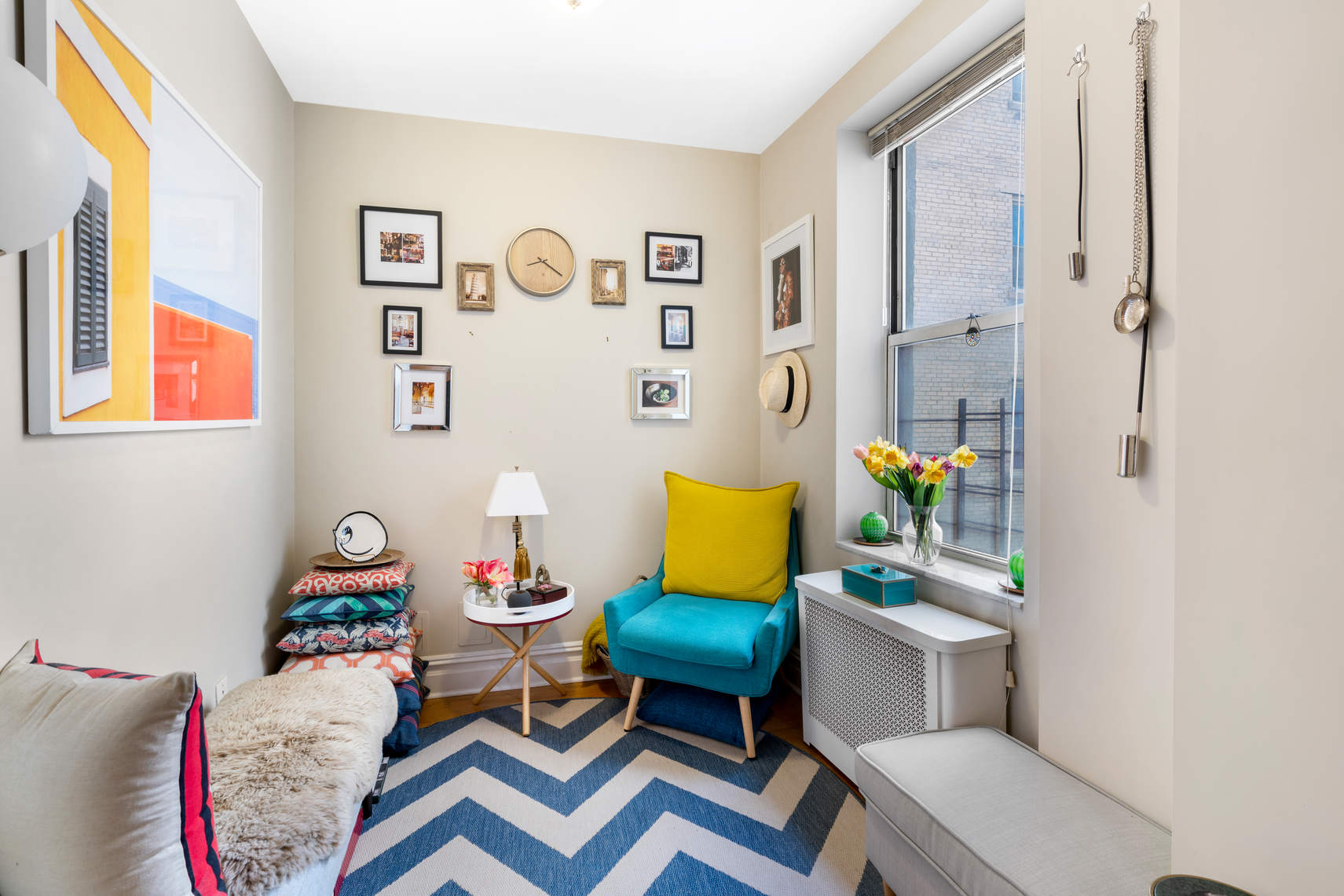 156-08 Riverside Drive West, Unit 2C Manhattan, NY 10032 - Photo 8 of 10 a living room with furniture and wooden floor