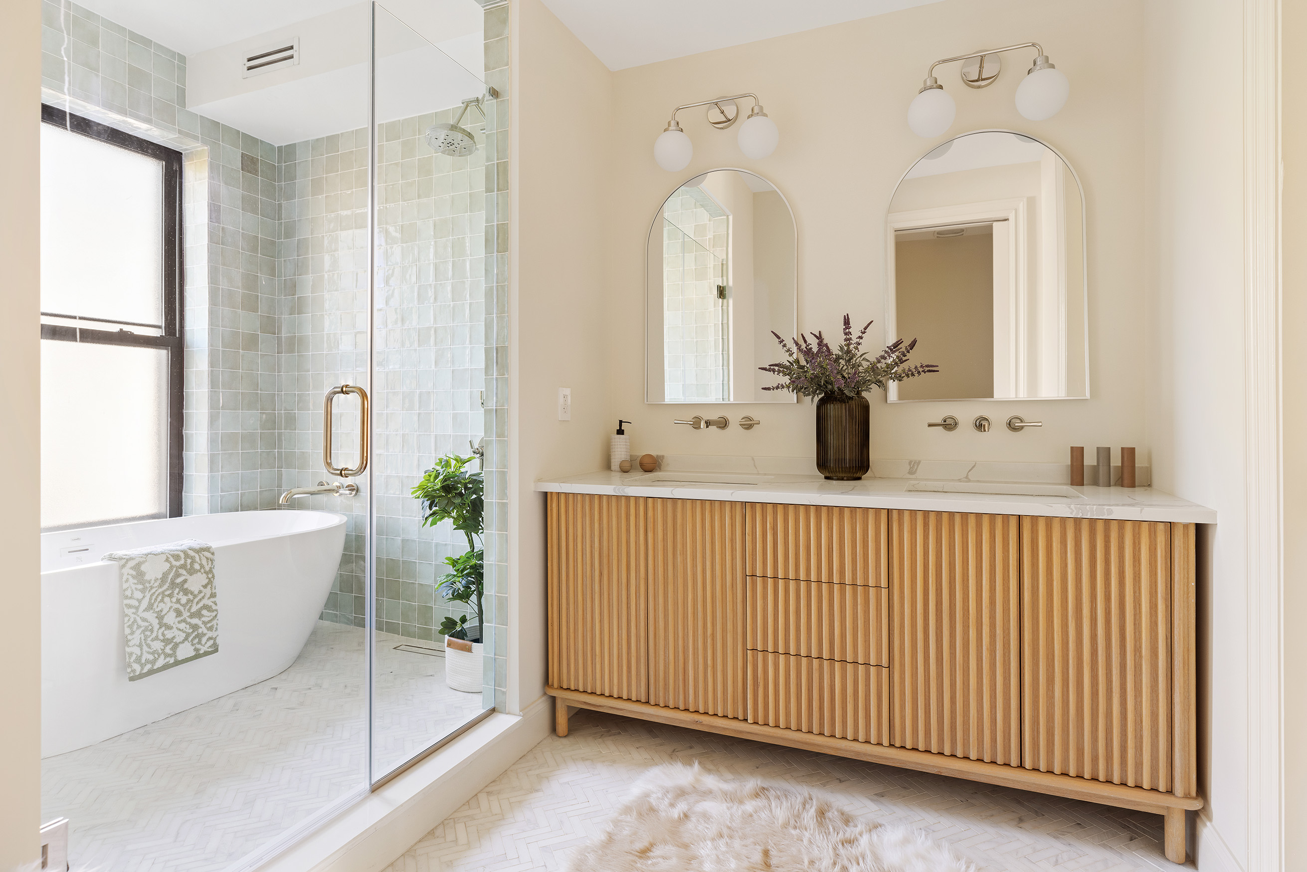 198 Madison Street, Unit SF Brooklyn, NY 11216 - Photo 10 of 19 a bathroom with a double vanity sink mirror and shower
