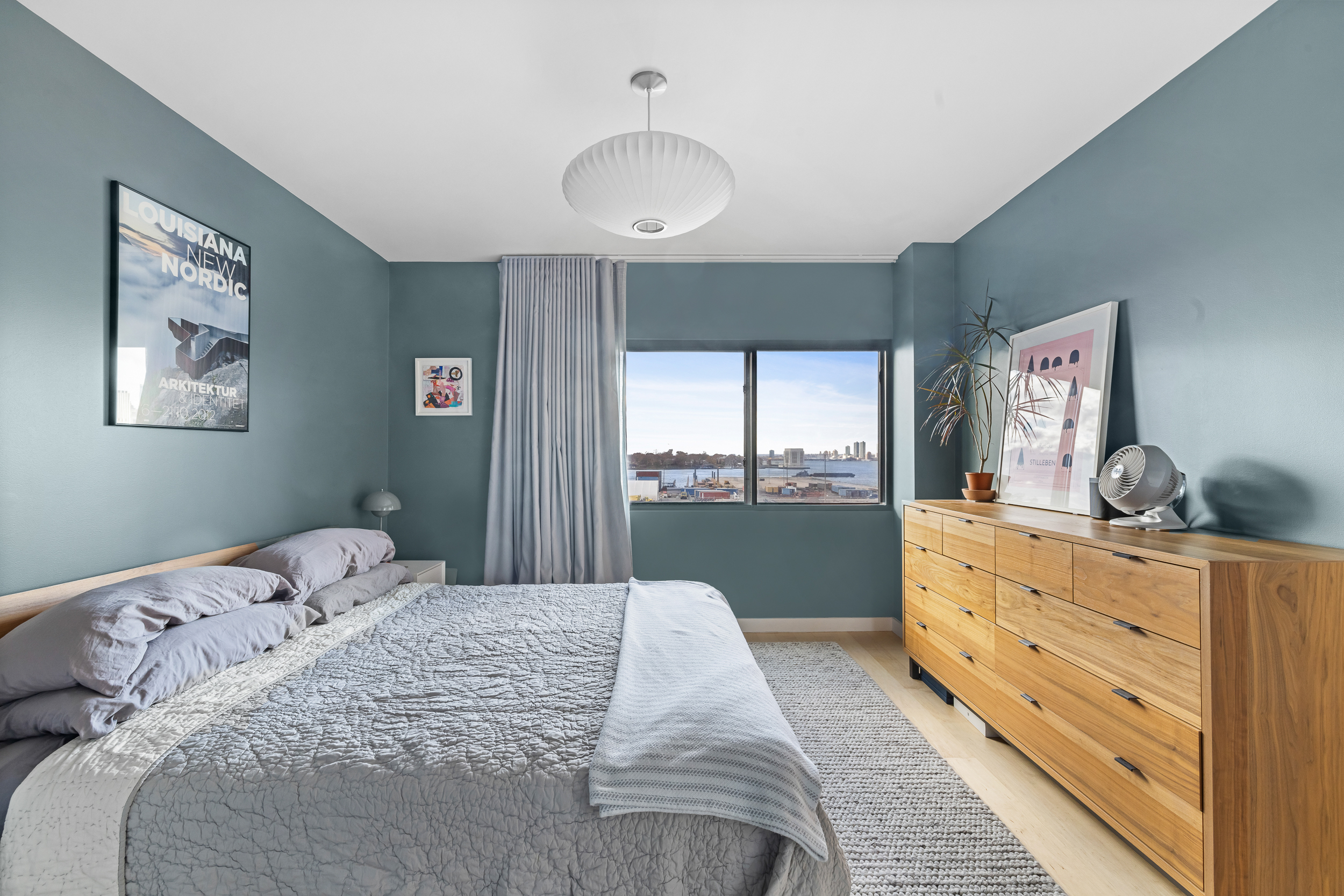 20 Tiffany Place, Unit 6N Brooklyn, NY 11231 - Photo 6 of 12 a bedroom with a large bed and a window