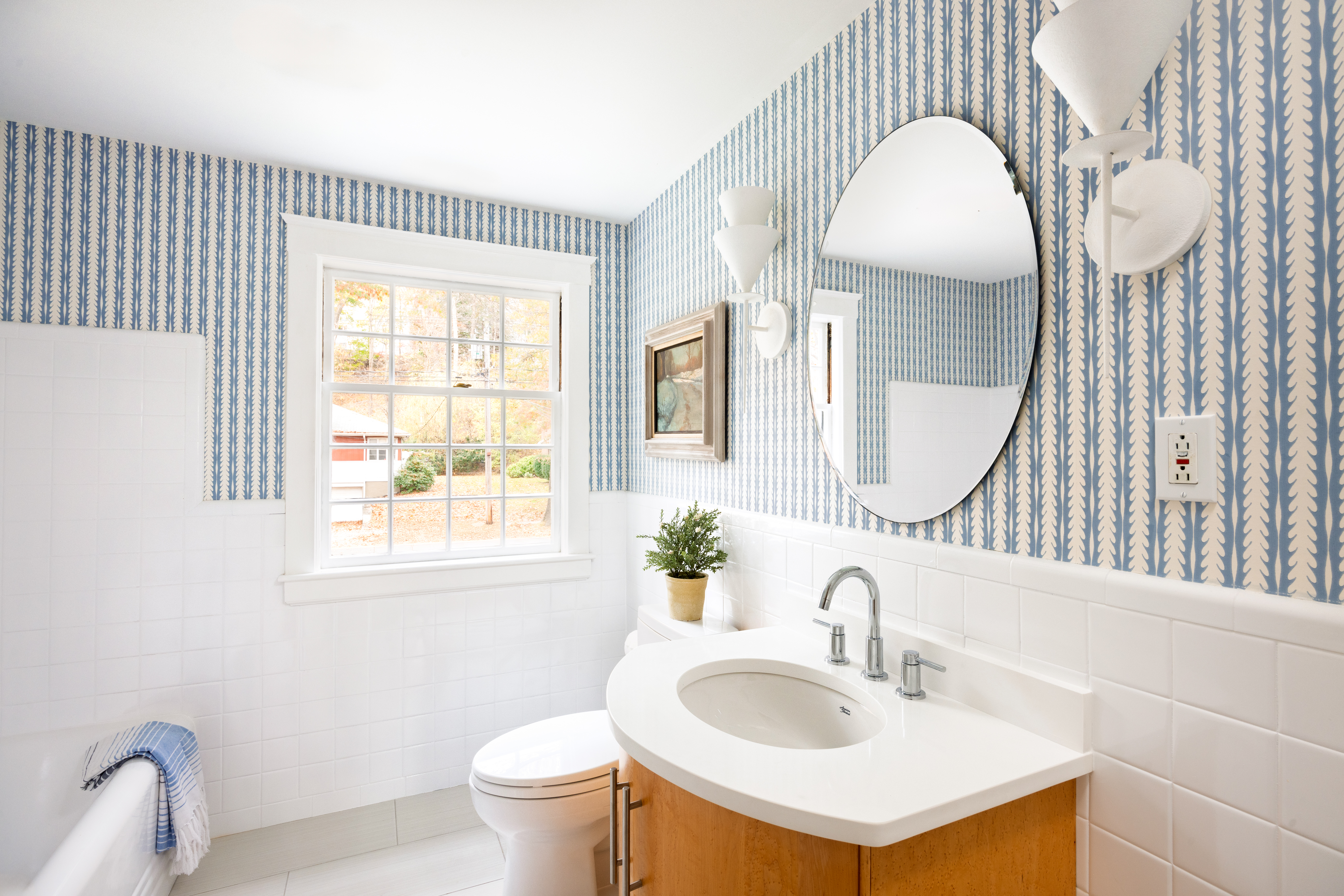 111 Beverly Road Brookline, MA 02467 - Photo 23 of 27 a bathroom with a sink and a mirror