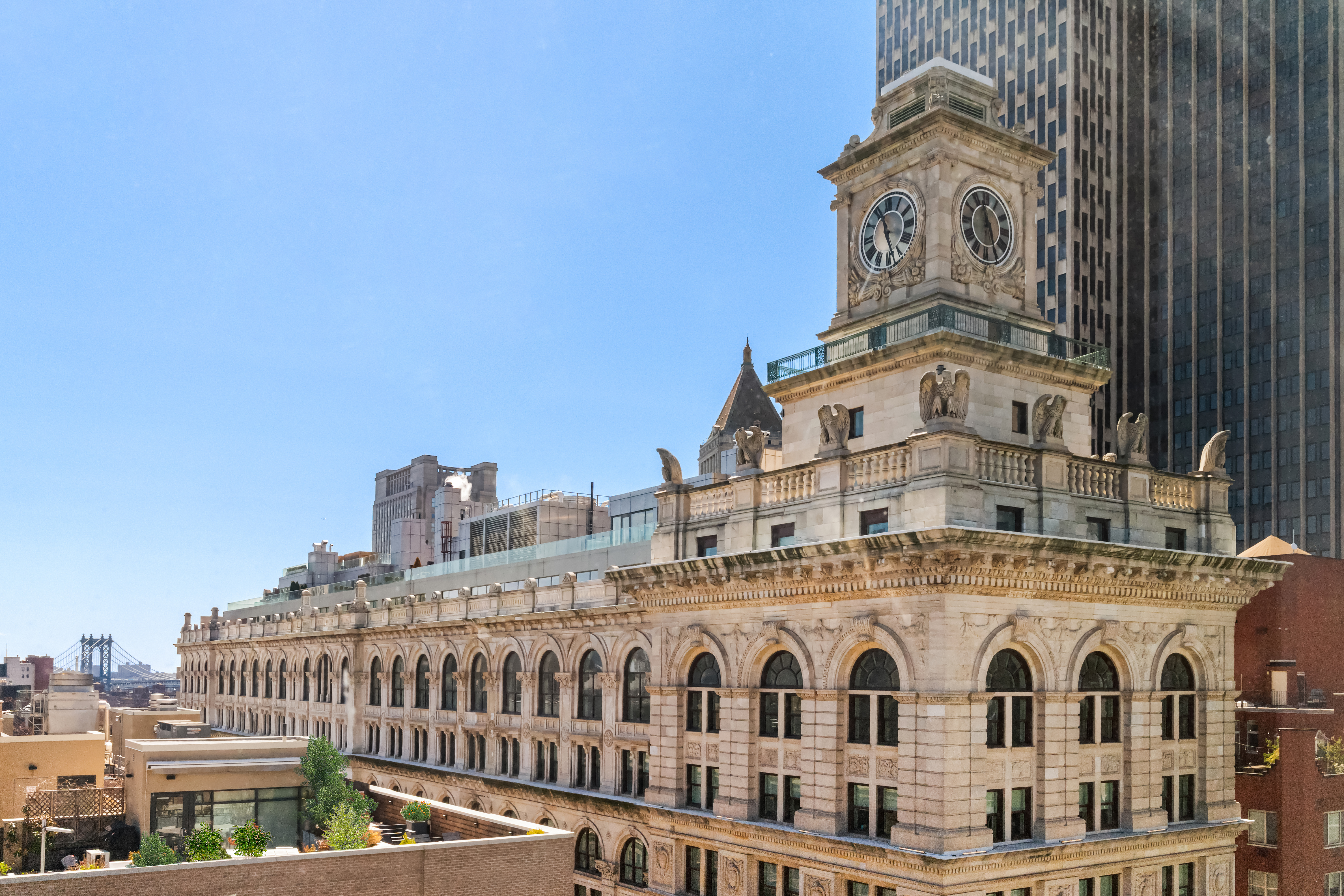 91 Leonard Street, Unit 16B Manhattan, NY 10013 - Photo 4 of 20 a large building with a clock on it
