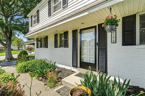 a front view of a house with a porch