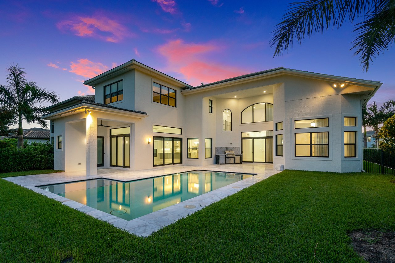 17352 Rosella Road Boca Raton, FL 33496 - Photo 2 of 41 a front view of a house with swimming pool having outdoor seating