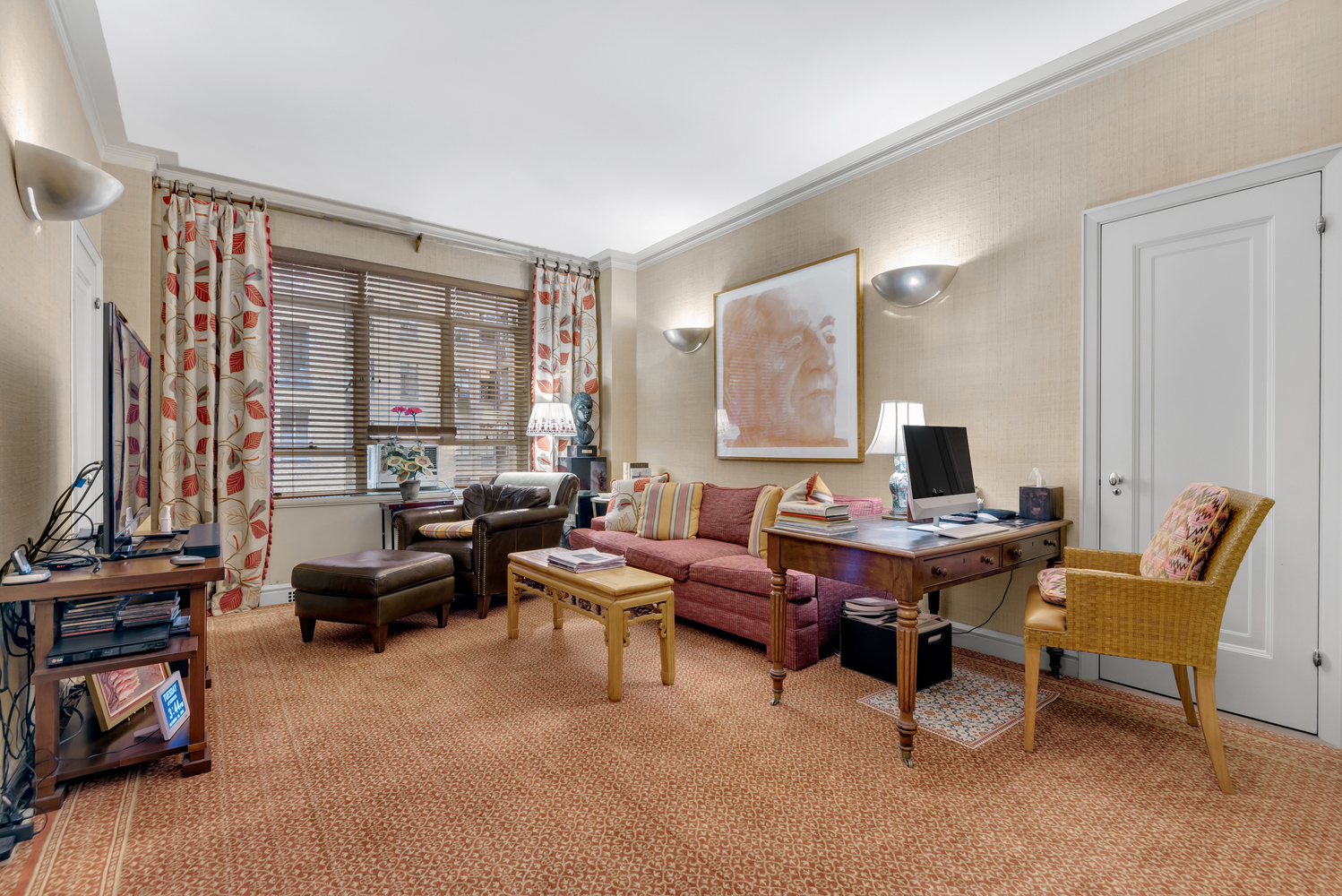 115 Central Park West, Unit 3B Manhattan, NY 10023 - Photo 8 of 20 a living room with furniture and a flat screen tv