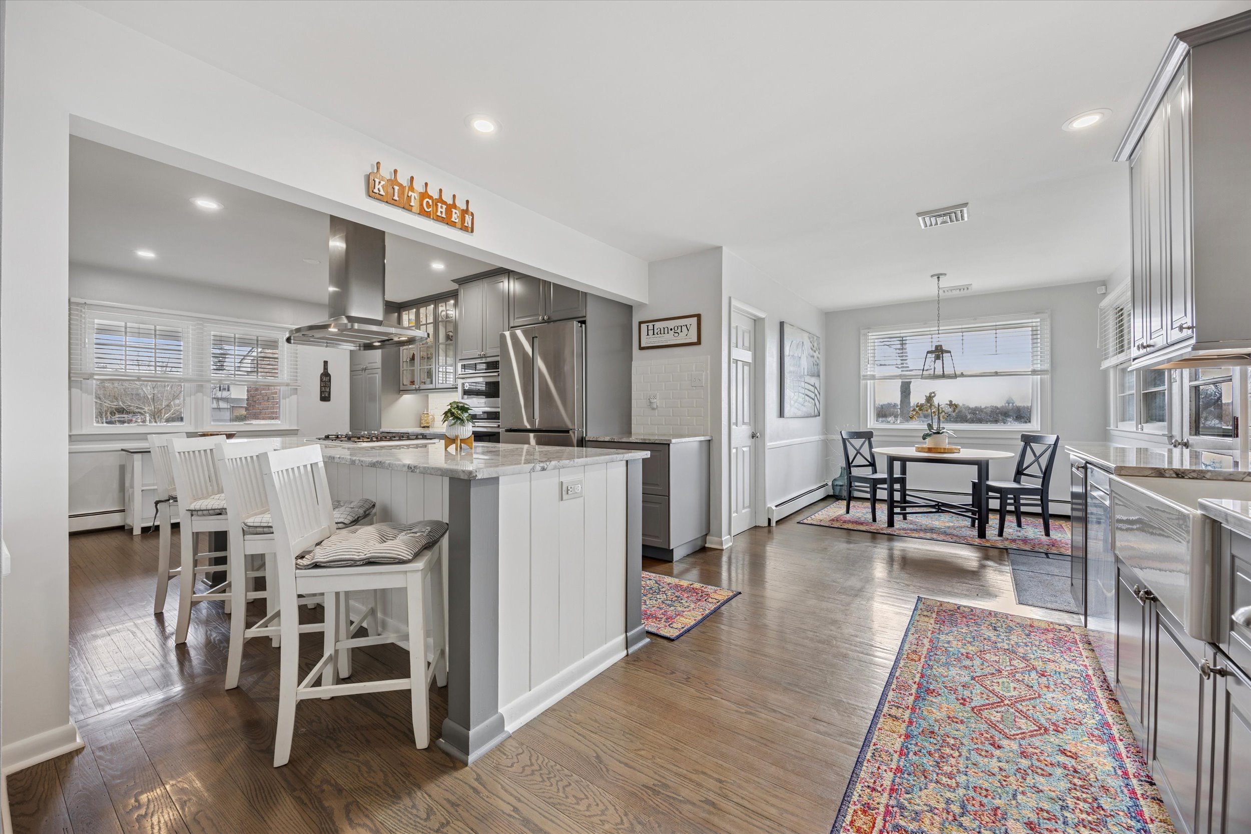 535 Bell Lane Ambler, PA 19002 - Photo 11 of 45 a living room with lots of furniture and kitchen view