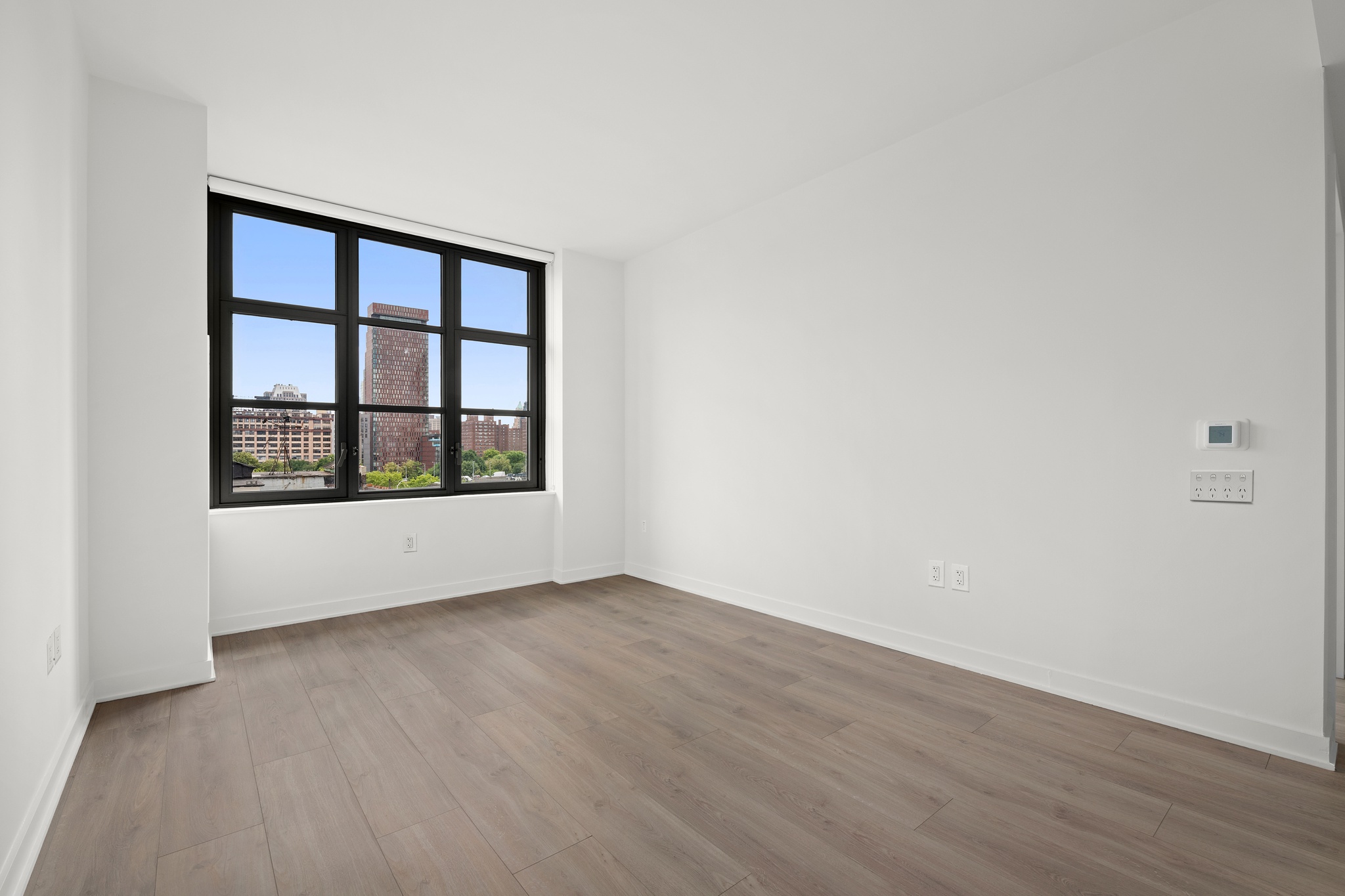 160 Front Street, Unit 706 Brooklyn, NY 11201 - Photo 2 of 17 a view of an empty room with window