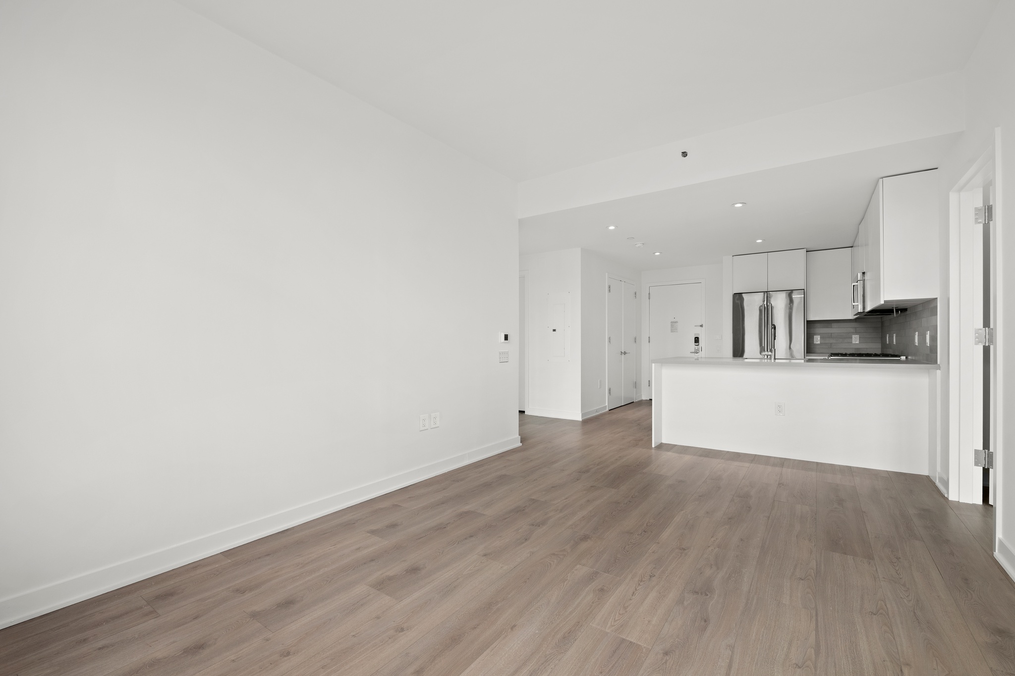 160 Front Street, Unit 706 Brooklyn, NY 11201 - Photo 4 of 17 a view of kitchen with wooden floor