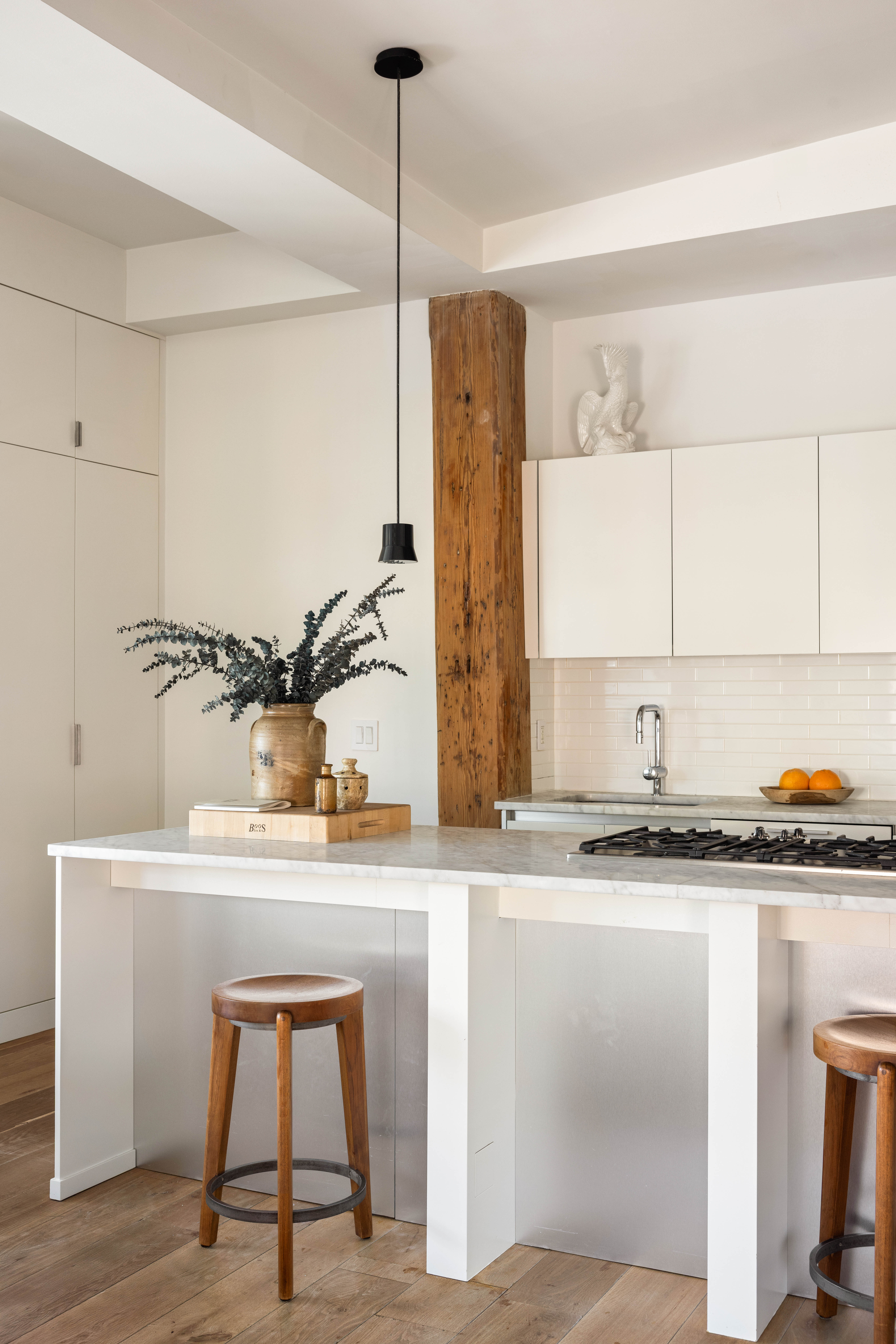 20 Henry Street, Unit 5D/S Brooklyn, NY 11201 - Photo 3 of 15 a kitchen with stainless steel appliances granite countertop a sink a stove and a wooden floor