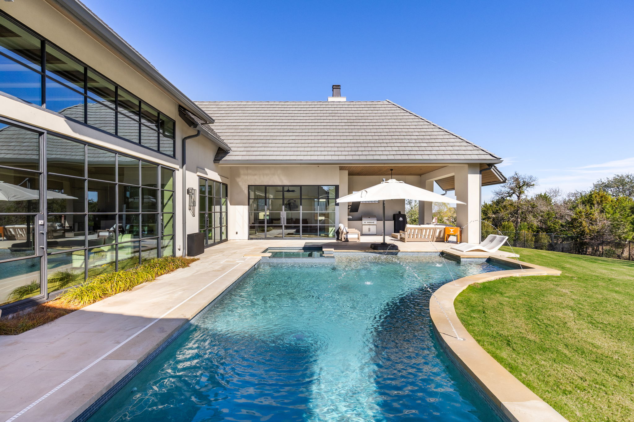 522 Delayne Drive Austin, TX 78737 - Photo 8 of 23 a view of a swimming pool with sitting area