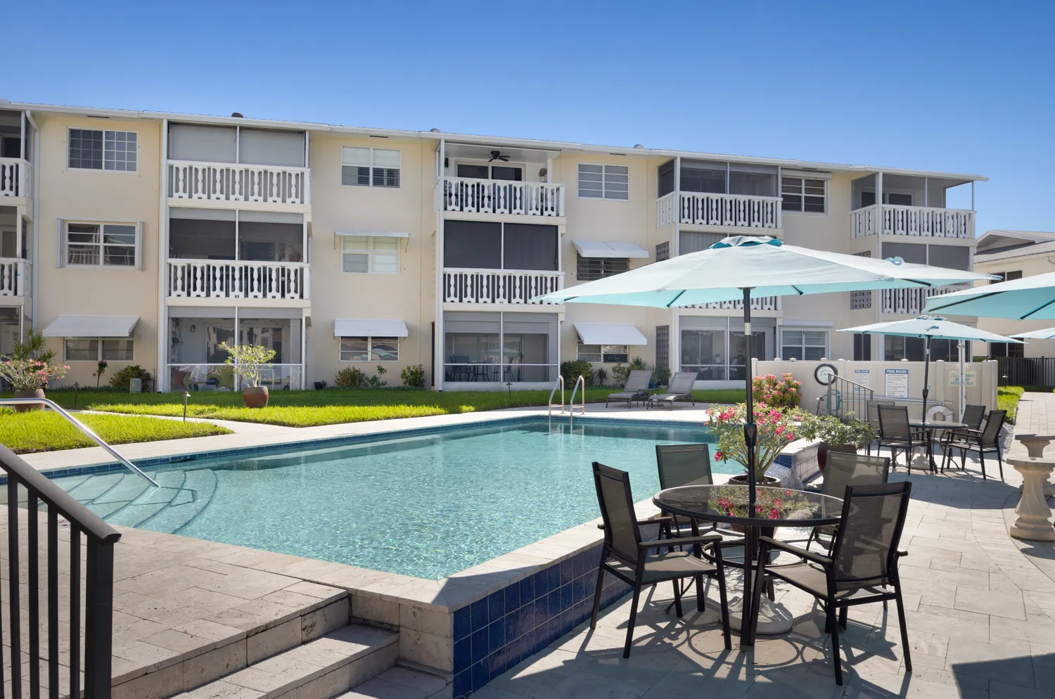 a view of swimming pool with outdoor seating