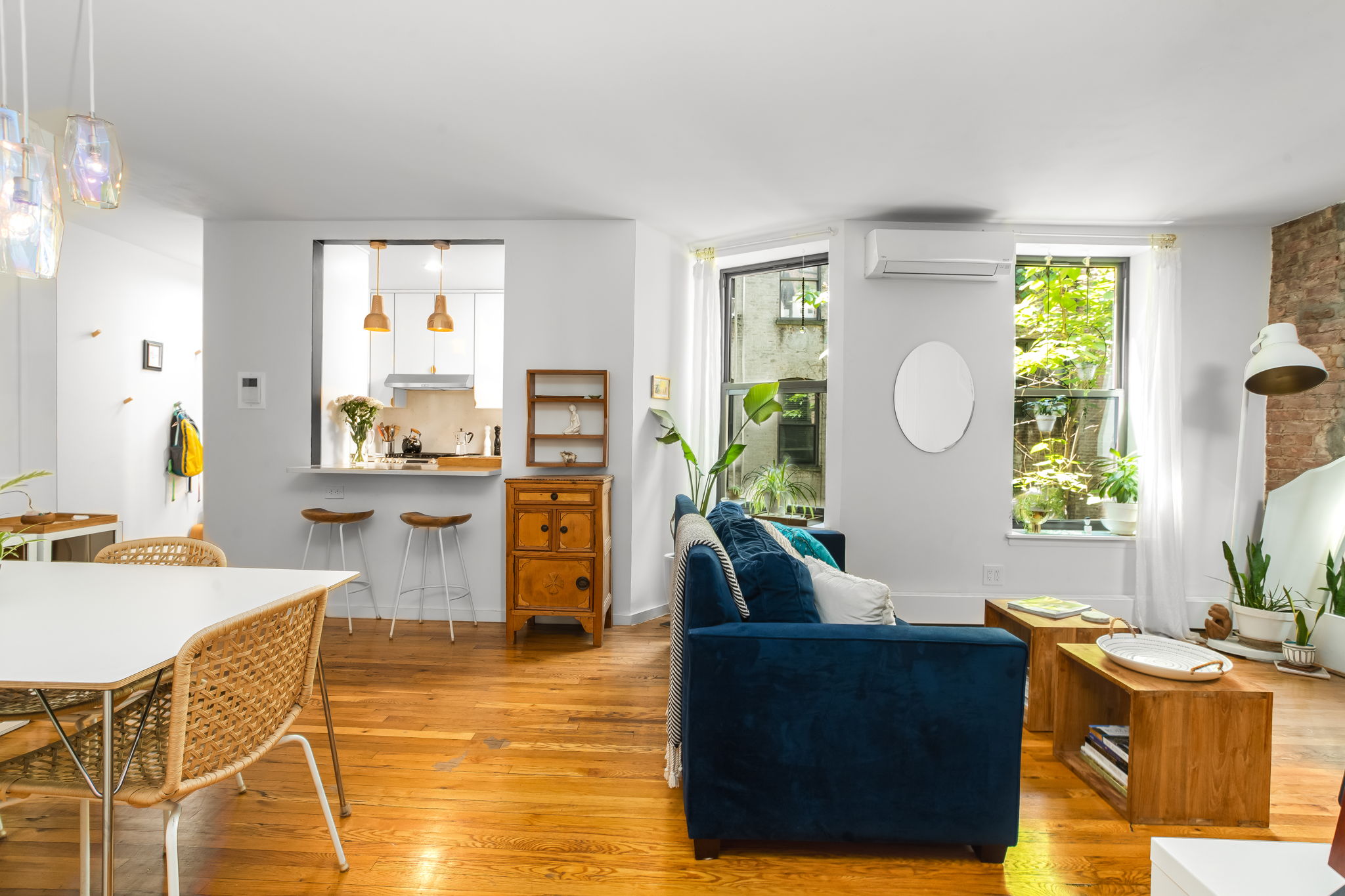 427 St Johns Place, Unit 2B Brooklyn, NY 11238 - Photo 1 of 11 a living room with furniture and painting on the wall