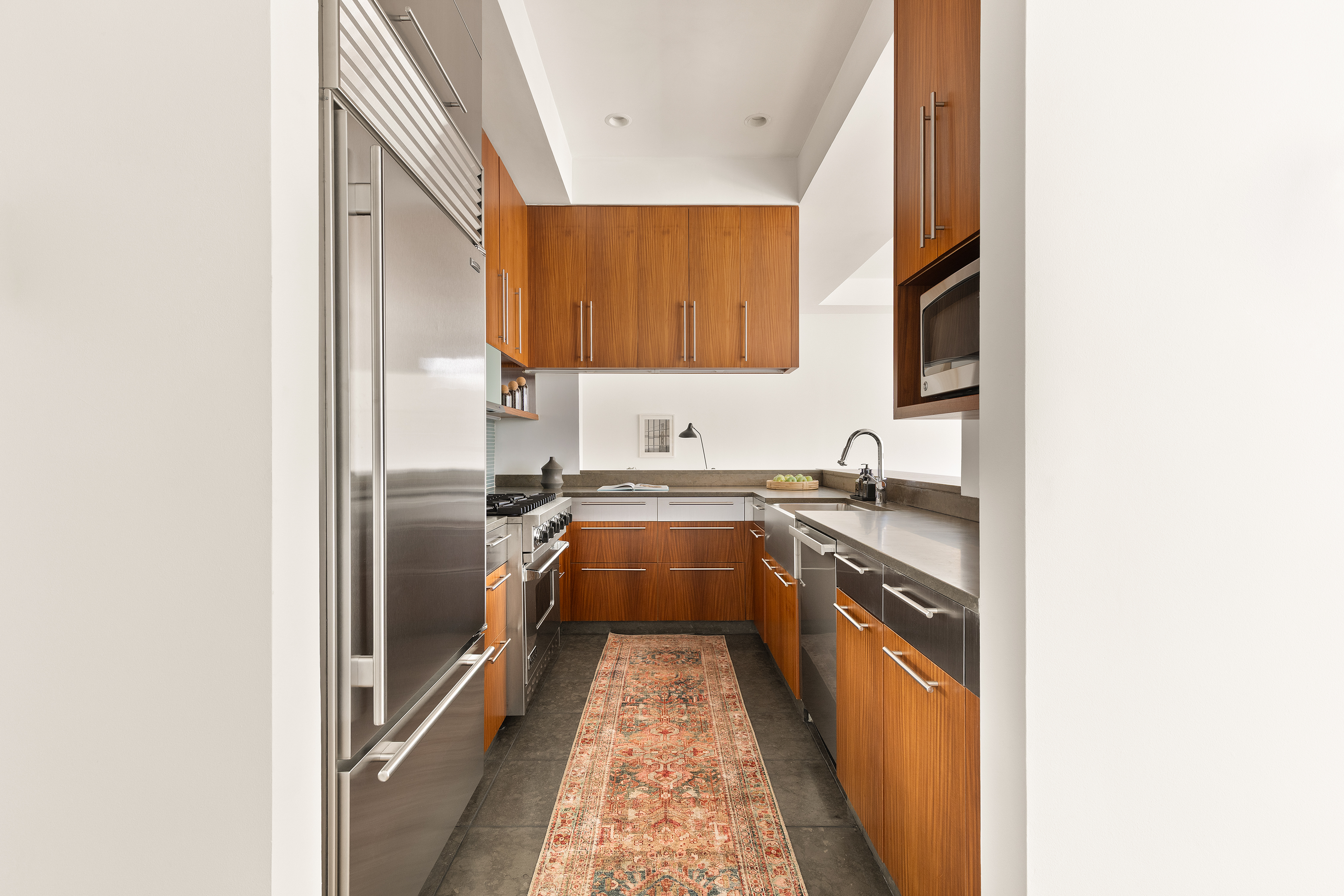 17 Bergen Street, Unit 2 Brooklyn, NY 11201 - Photo 7 of 14 a kitchen with a sink and a refrigerator