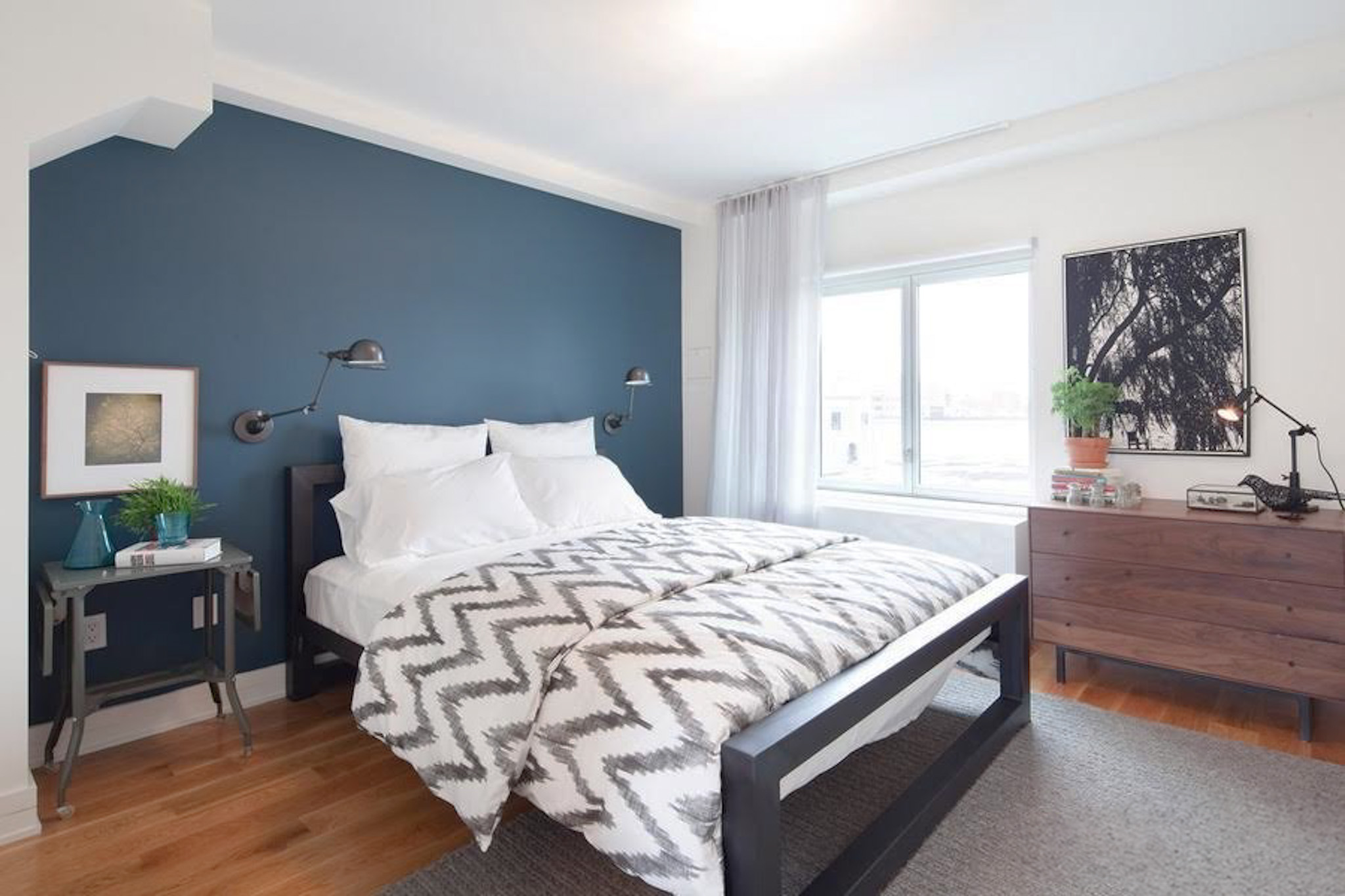 224 Wythe Avenue, Unit 68E Brooklyn, NY 11249 - Photo 5 of 10 a bedroom with a bed and window