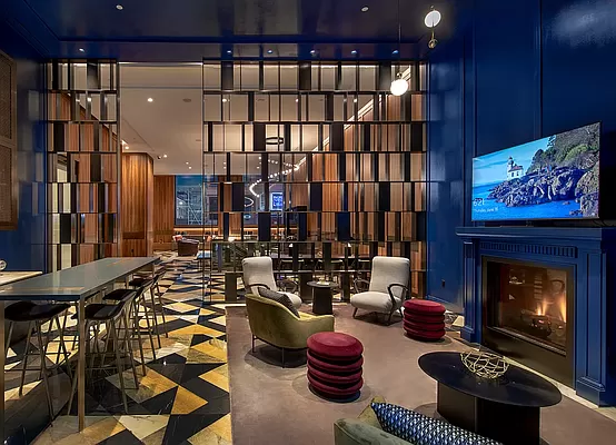 30 East 29th Street, Unit PHB Manhattan, NY 10016 - Photo 17 of 19 a living room with furniture and a fireplace