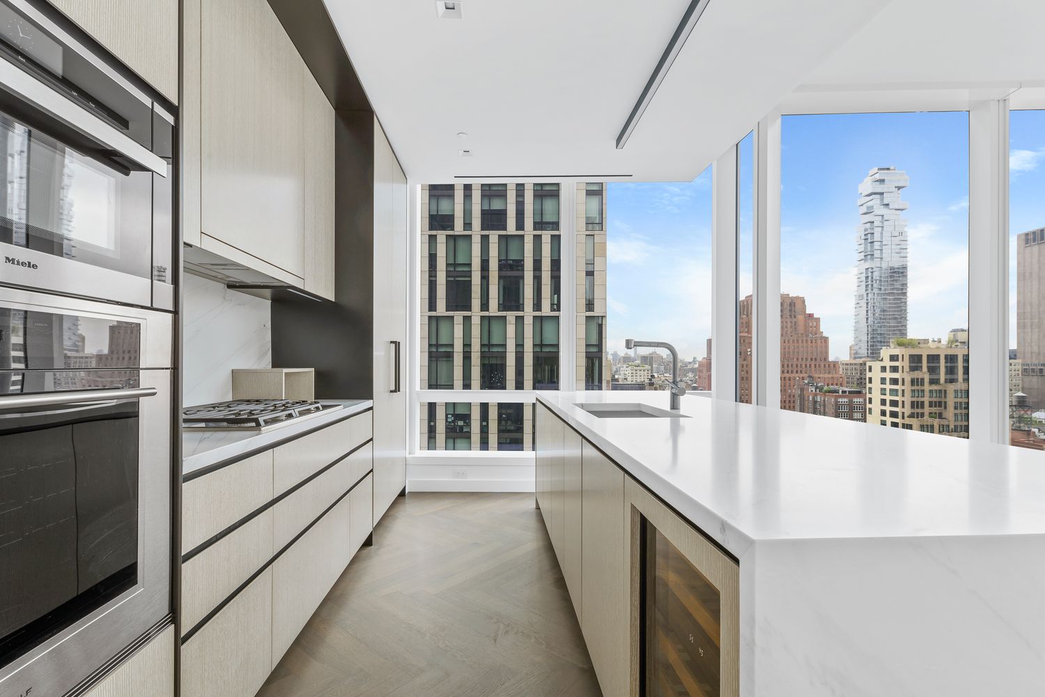 111 Murray Street, Unit 21A Manhattan, NY 10007 - Photo 2 of 14 a large white kitchen with a large window