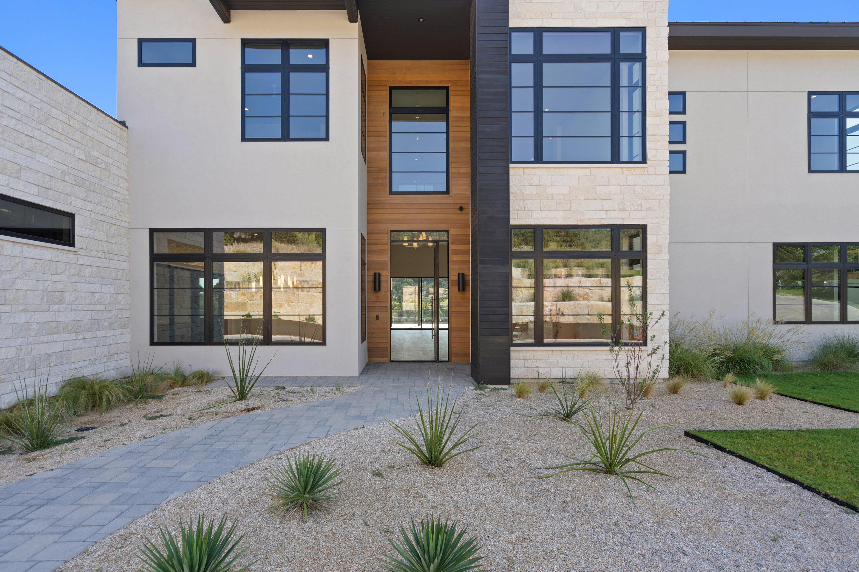 1905 Hallam Drive Austin, TX 78746 - Photo 4 of 39 a front view of a house